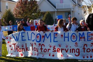 Trent Nelson  |  The Salt Lake Tribune
SFC Mike Jones, Utah National Guard, was welcomed home to Eagle Mountain by family, friends and neighbors who lined the streets of Eagle Mountain Friday, November 12, 2010. On his fourth deployment, Jones was injured in Afghanistan in September.