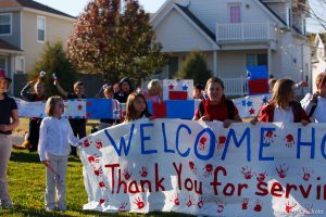 Trent Nelson  |  The Salt Lake Tribune
SFC Mike Jones, Utah National Guard, was welcomed home to Eagle Mountain by family, friends and neighbors who lined the streets of Eagle Mountain Friday, November 12, 2010. On his fourth deployment, Jones was injured in Afghanistan in September.