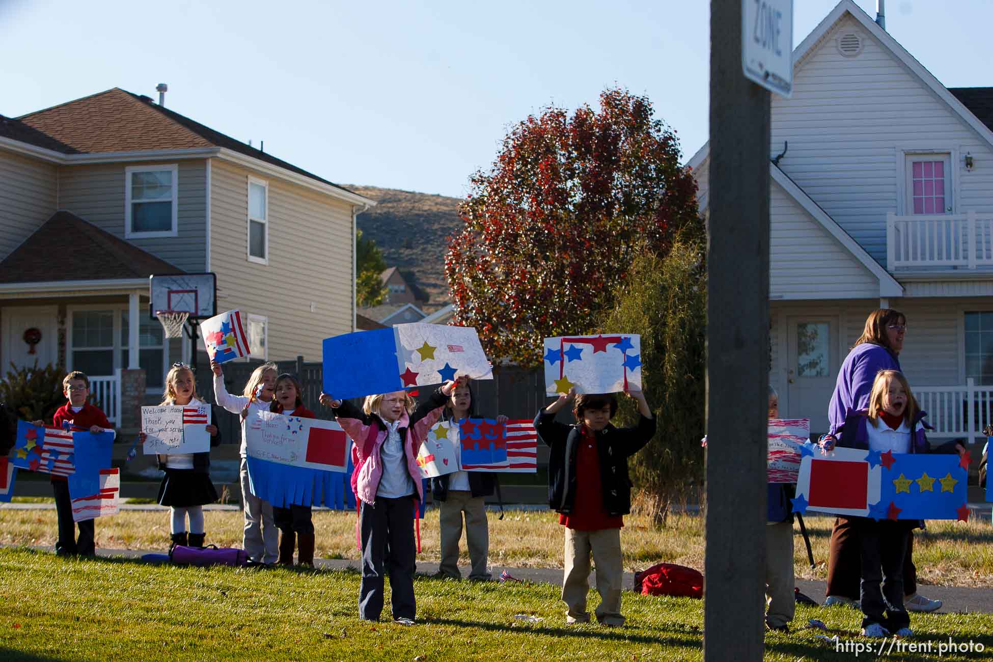 Trent Nelson  |  The Salt Lake Tribune
SFC Mike Jones, Utah National Guard, was welcomed home to Eagle Mountain by family, friends and neighbors who lined the streets of Eagle Mountain Friday, November 12, 2010. On his fourth deployment, Jones was injured in Afghanistan in September.