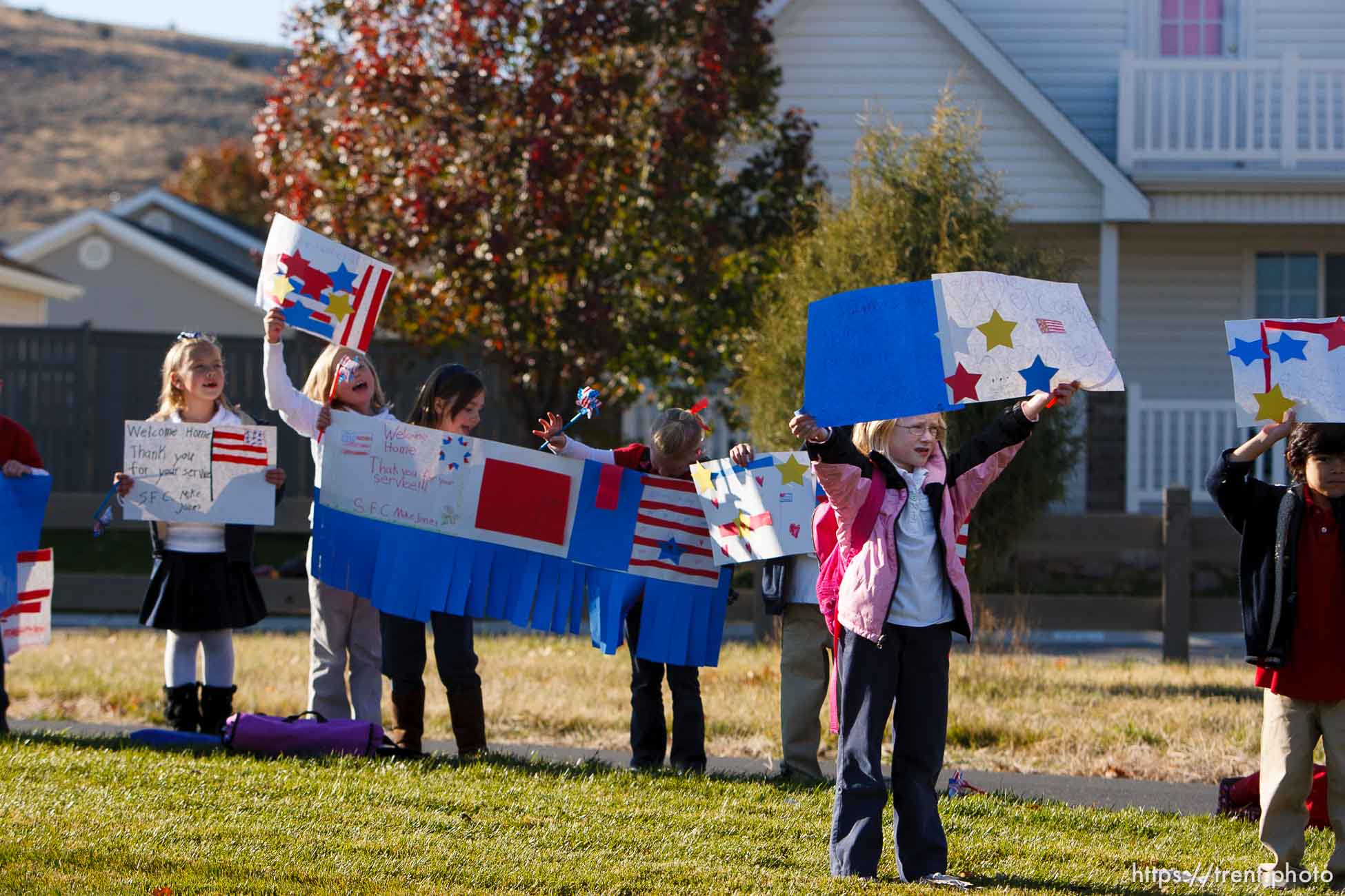 Trent Nelson  |  The Salt Lake Tribune
SFC Mike Jones, Utah National Guard, was welcomed home to Eagle Mountain by family, friends and neighbors who lined the streets of Eagle Mountain Friday, November 12, 2010. On his fourth deployment, Jones was injured in Afghanistan in September.