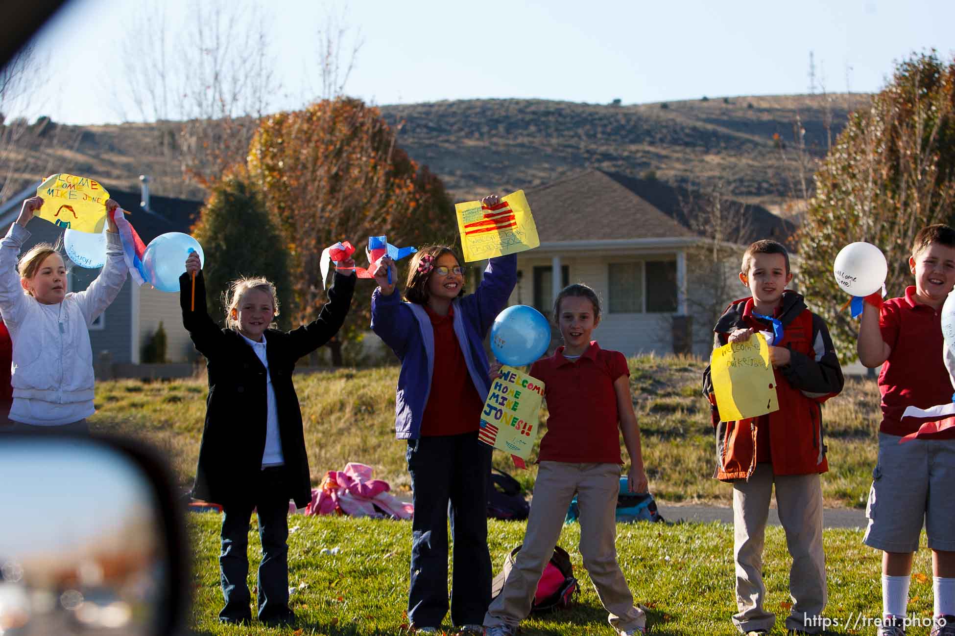 Trent Nelson  |  The Salt Lake Tribune
SFC Mike Jones, Utah National Guard, was welcomed home to Eagle Mountain by family, friends and neighbors who lined the streets of Eagle Mountain Friday, November 12, 2010. On his fourth deployment, Jones was injured in Afghanistan in September.