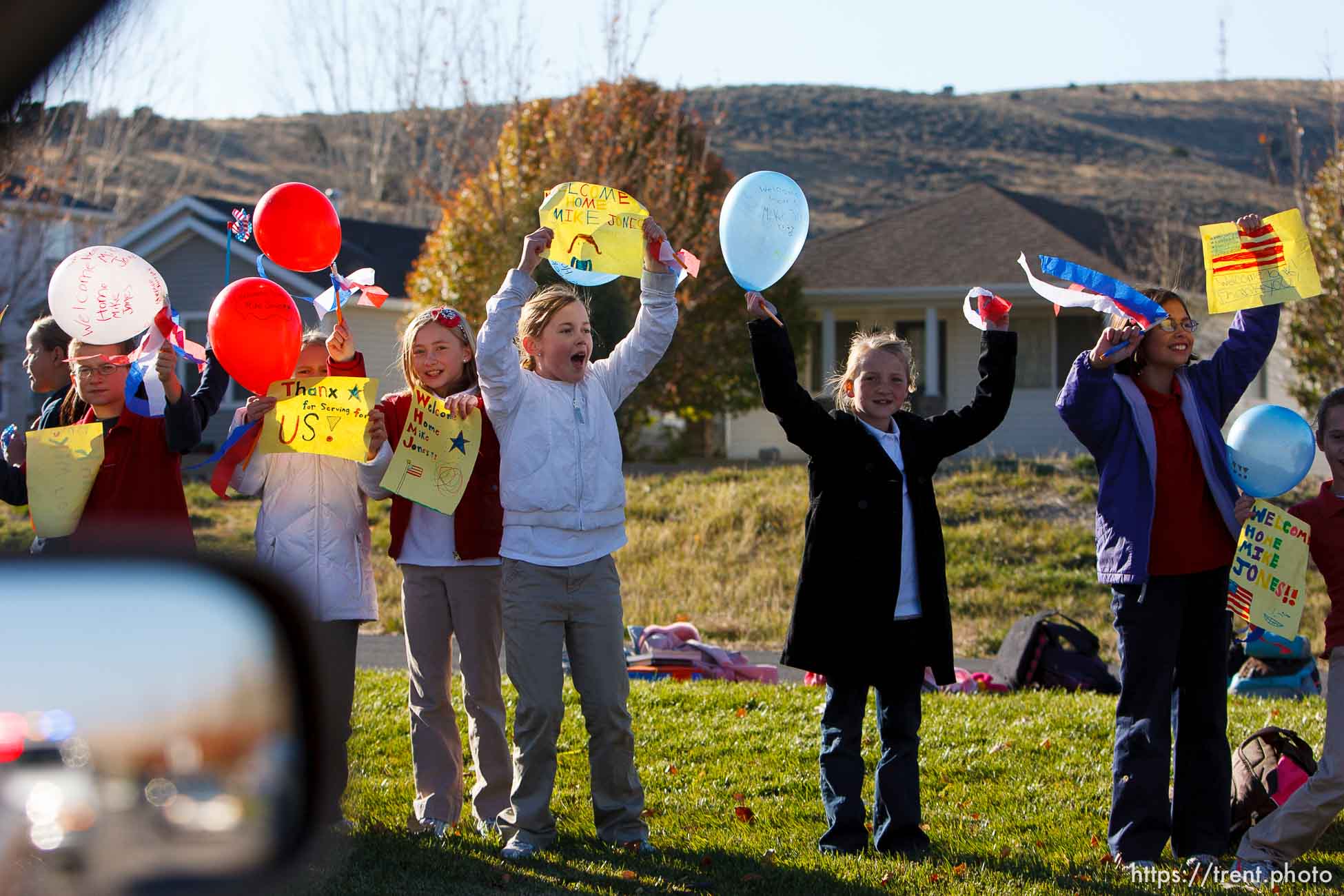 Trent Nelson  |  The Salt Lake Tribune
SFC Mike Jones, Utah National Guard, was welcomed home to Eagle Mountain by family, friends and neighbors who lined the streets of Eagle Mountain Friday, November 12, 2010. On his fourth deployment, Jones was injured in Afghanistan in September.