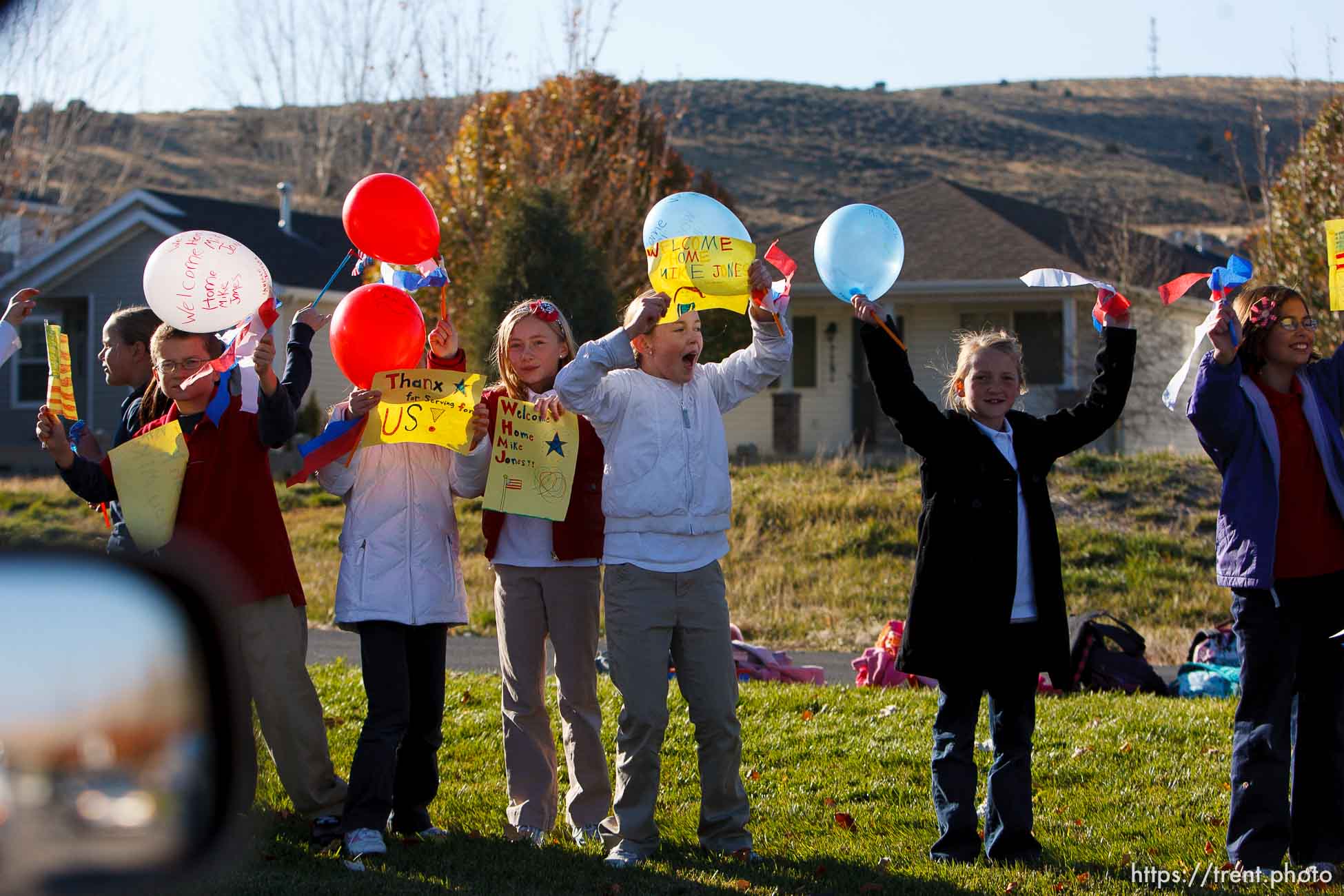 Trent Nelson  |  The Salt Lake Tribune
SFC Mike Jones, Utah National Guard, was welcomed home to Eagle Mountain by family, friends and neighbors who lined the streets of Eagle Mountain Friday, November 12, 2010. On his fourth deployment, Jones was injured in Afghanistan in September.