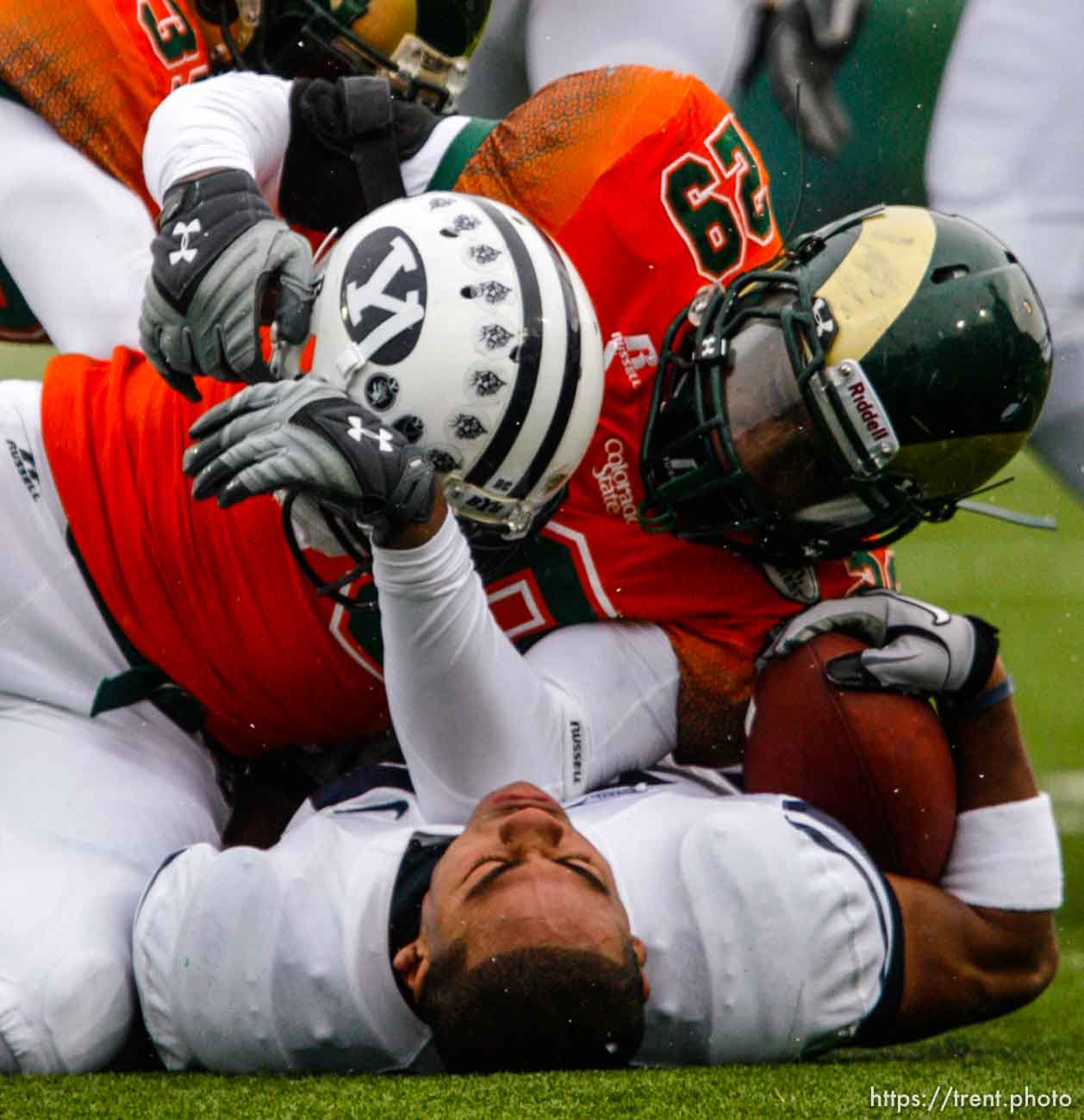 Trent Nelson  |  The Salt Lake Tribune
Colorado State's Broderick Sargent pulls the helmet off BYU running back Joshua Quezada (20) during the second half. BYU vs. Colorado State, college football, Saturday, November 13, 2010. BYU won 49-10.