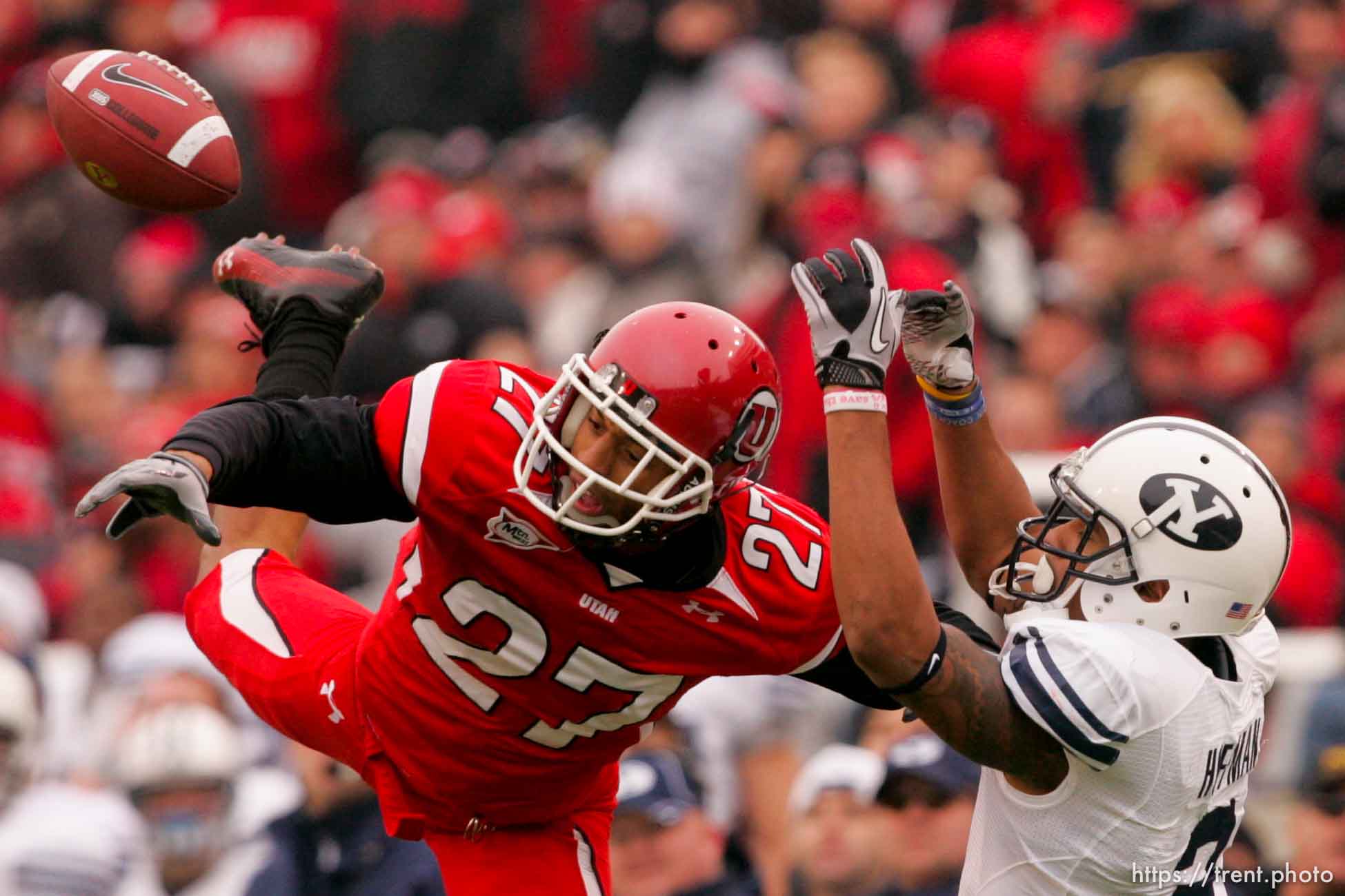 Trent Nelson  |  The Salt Lake Tribune

Utah Utes cornerback Brandon Burton #27 breaks up a pass meant for BYU receiver Cody Hoffman (2)  to set up an interception for Utah Utes cornerback Brian Blechen #2 as the Utes face BYU in the second quarter at Rice-Eccles Stadium Saturday, November 27, 2010.