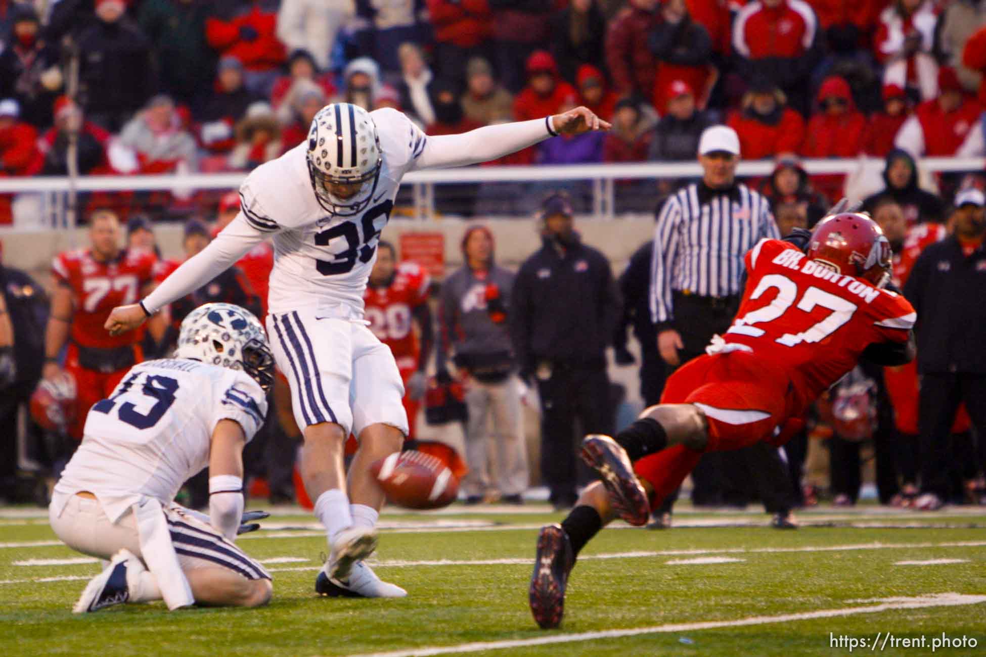 Trent Nelson  |  The Salt Lake Tribune

Brandon Burton blocks a field goal attempt by BYU kicker Mitch Payne (38) to win. Utah beats BYU on a blocked field goal attempt at Rice-Eccles Stadium Saturday, November 27, 2010. The final score was Utah 17-BYU 16.