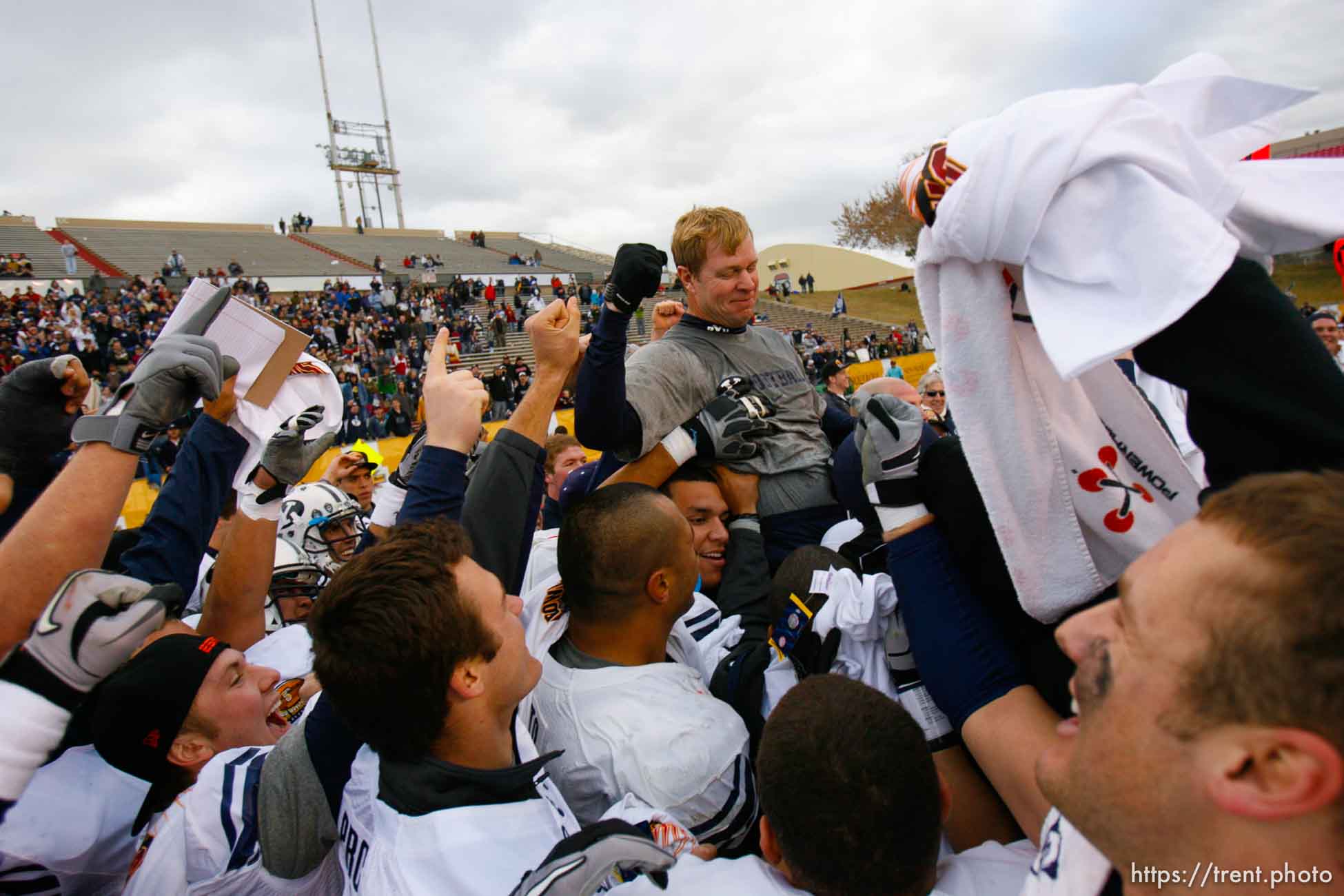 Trent Nelson  |  The Salt Lake Tribune
BYU coach Bronco Mendenhall and his players celebrate as BYU defeats UTEP in the New Mexico Bowl, college football Saturday, December 18, 2010 in Albuquerque, New Mexico.