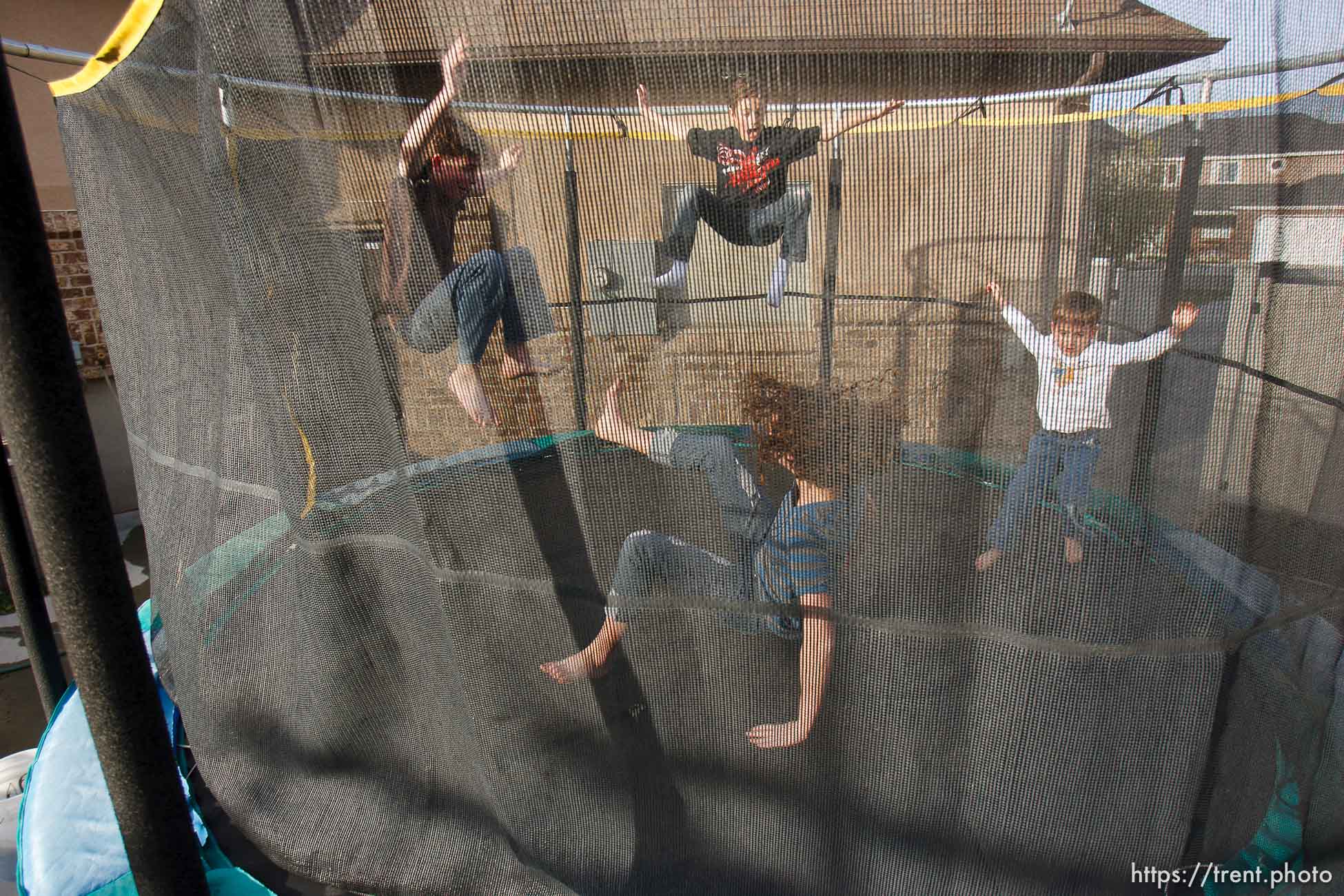 Trent Nelson  |  The Salt Lake Tribune
Four of new Utah State Senator Aaron Osmond's children jump on a trampoline at the family's home in South Jordan, Utah, Friday, May 6, 2011. Left to right, Daniel, Ryan, Madalyn and Jackson.