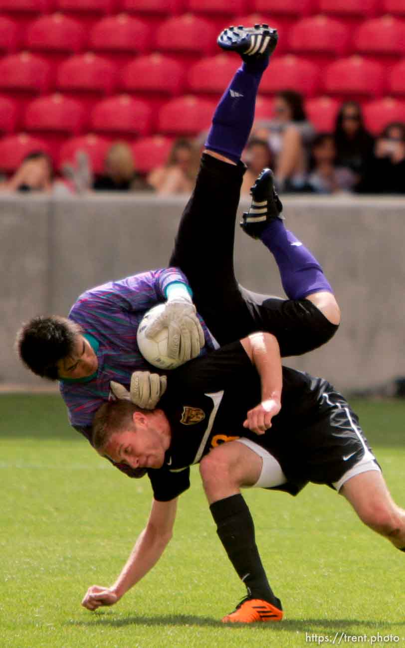 Trent Nelson  |  The Salt Lake Tribune
Juan Diego goalkeeper Du Nguyen makes a save and flips over Wasatch's Michael Brown. Wasatch defeats Juan Diego 1-0 in the 3A State Championship high school soccer game at Rio Tinto Stadium, in Sandy, Utah, Saturday, May 14, 2011.