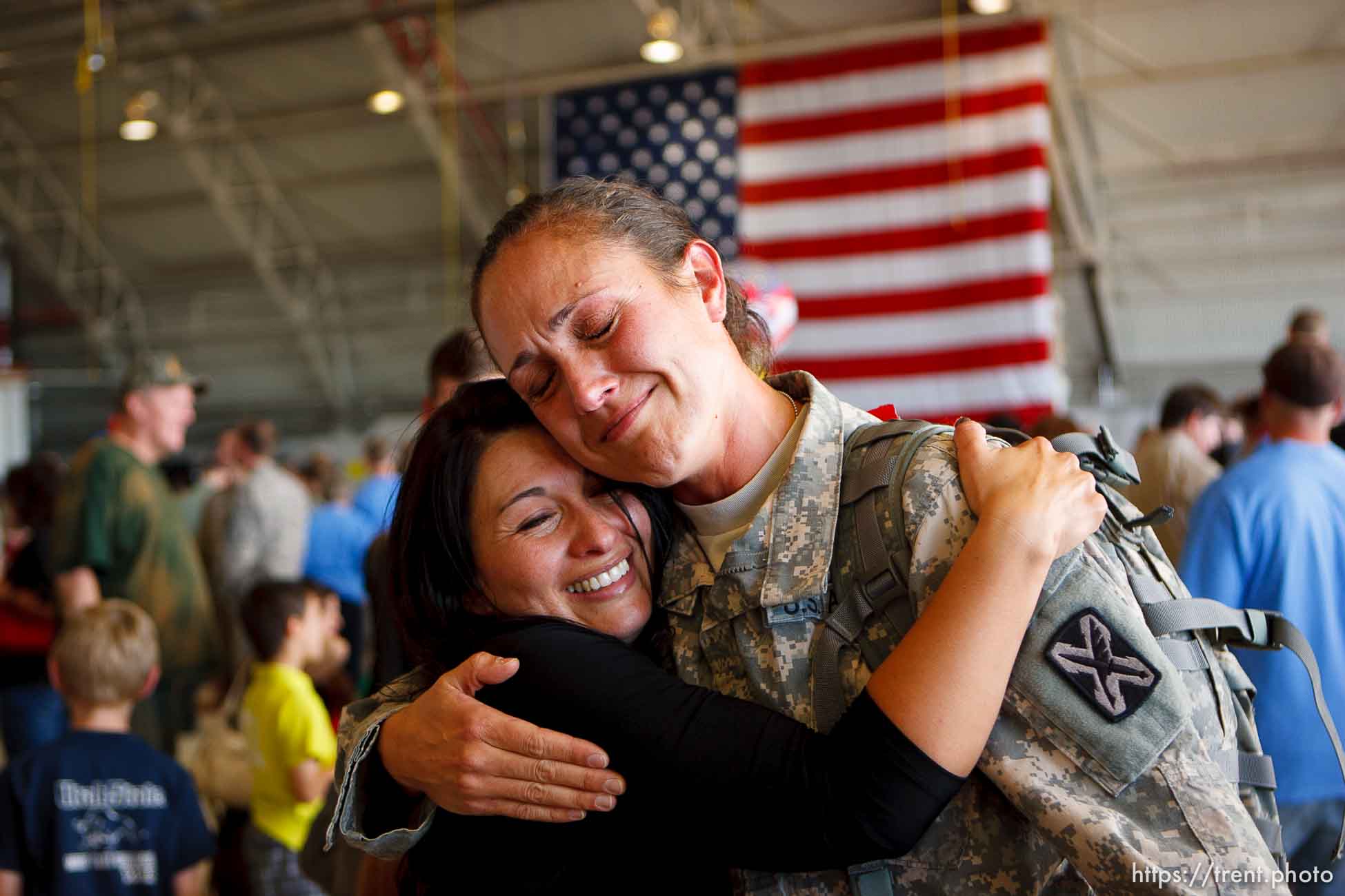 Trent Nelson  |  The Salt Lake Tribune
Spc Lisa Bradford, right, embraces Sgt Fresia Alder as the Utah National Guard's 141st Military Intelligence Battalion returned to Salt Lake City, Utah, from duty in Iraq Wednesday, June 15, 2011. The two served together in Iraq. Some 275 soldiers of the 141st deployed in June last year.