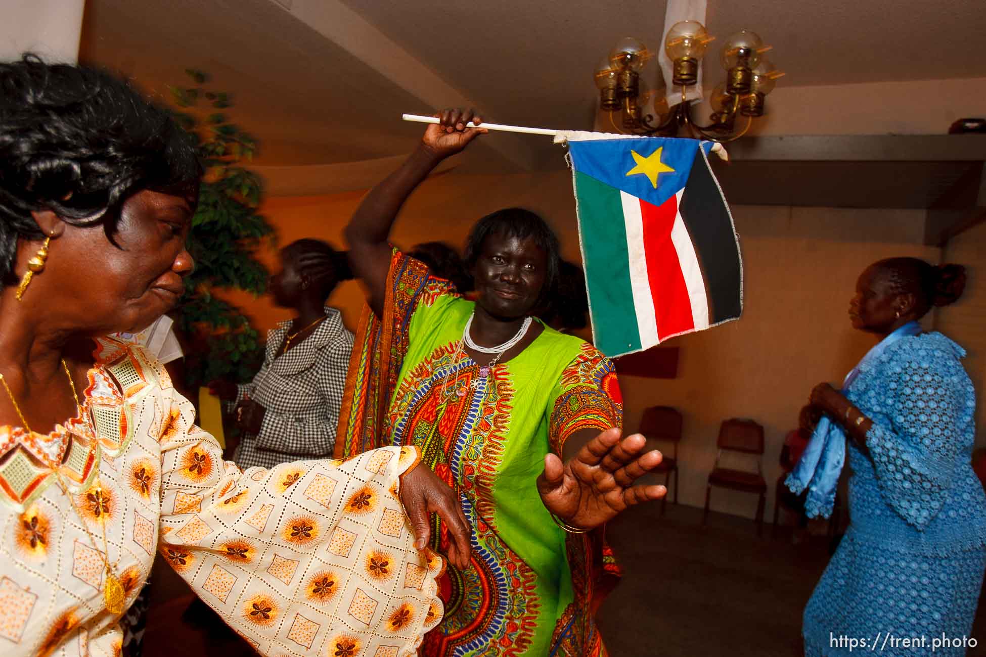 Trent Nelson  |  The Salt Lake Tribune
Mary Ugom and Regina Mark dance at the South Sudan Independence celebration in Salt Lake City, Utah, Saturday, July 9, 2011