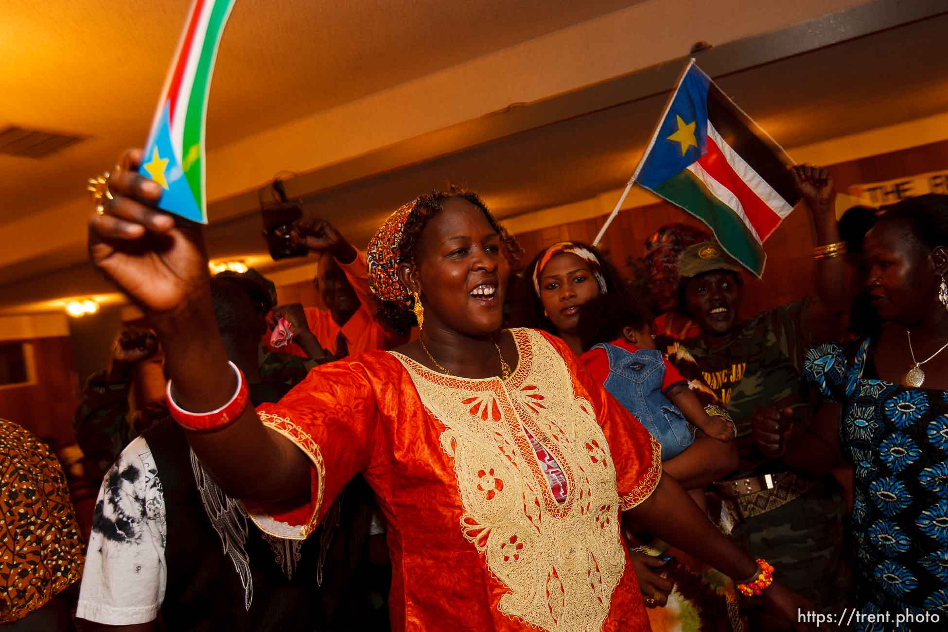 Trent Nelson  |  The Salt Lake Tribune
Nyayien Tarjak, center, among dancers at the South Sudan Independence celebration in Salt Lake City, Utah, Saturday, July 9, 2011