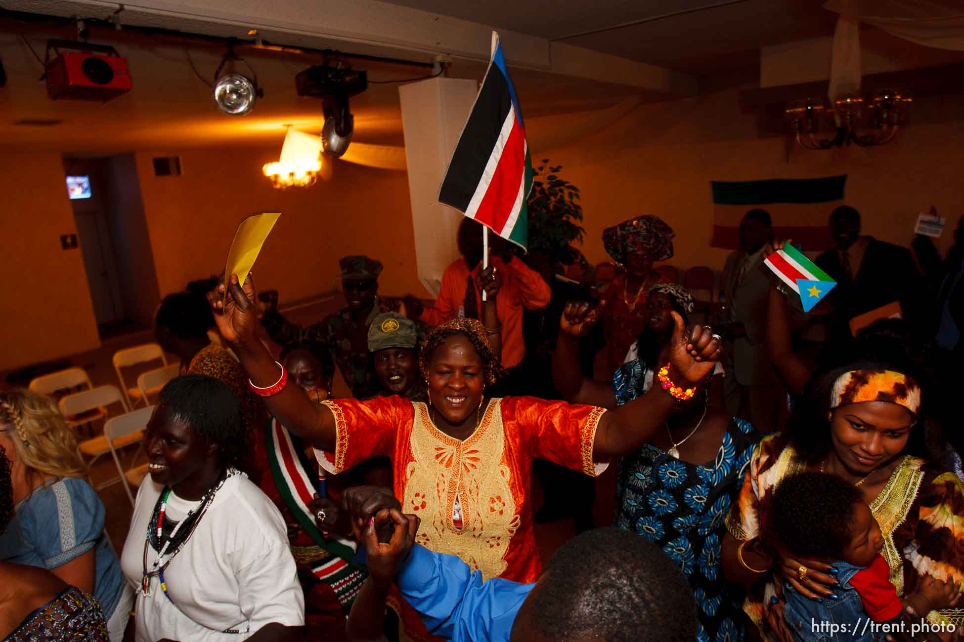 Trent Nelson  |  The Salt Lake Tribune
Nyayien Tarjak, center, among dancers at the South Sudan Independence celebration in Salt Lake City, Utah, Saturday, July 9, 2011