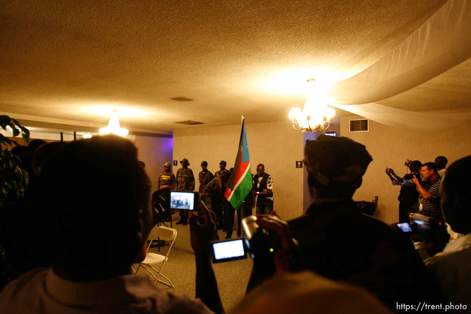 Trent Nelson  |  The Salt Lake Tribune
Cameras flock to the flag raising at the South Sudan Independence celebration in Salt Lake City, Utah, Saturday, July 9, 2011. scott winterton