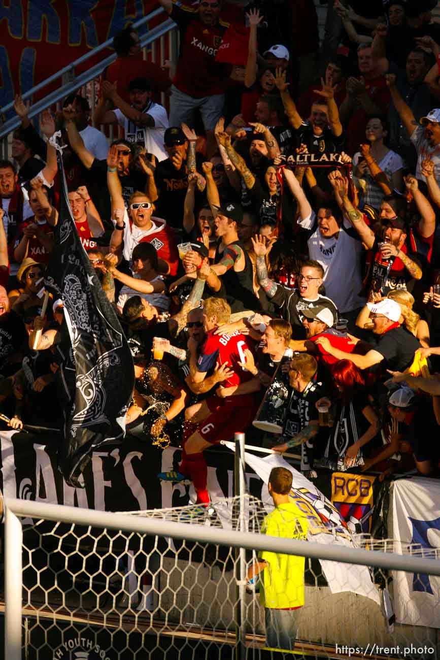 Trent Nelson  |  The Salt Lake Tribune
Real Salt Lake's Nat Borchers celebrates his first half goal by leaping into a crowd of fans in the Salt City United section. Real Salt Lake vs. New York Red Bulls at Rio Tinto Stadium in Sandy, Utah. Saturday, August 6, 2011.