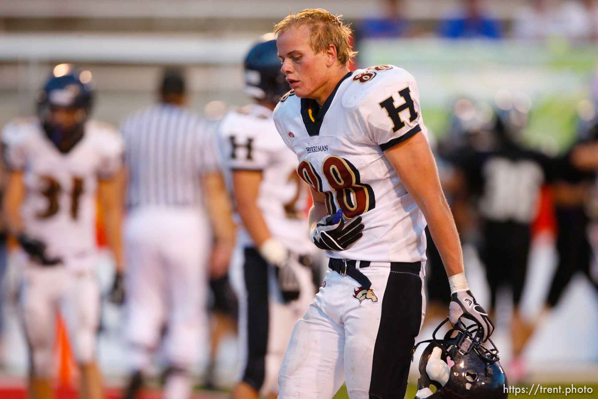 Trent Nelson  |  The Salt Lake Tribune
Herriman's David Christensen pukes. Herriman vs. Riverton High School football at Rice-Eccles Stadium in Salt Lake City, Utah, Saturday, August 27, 2011.