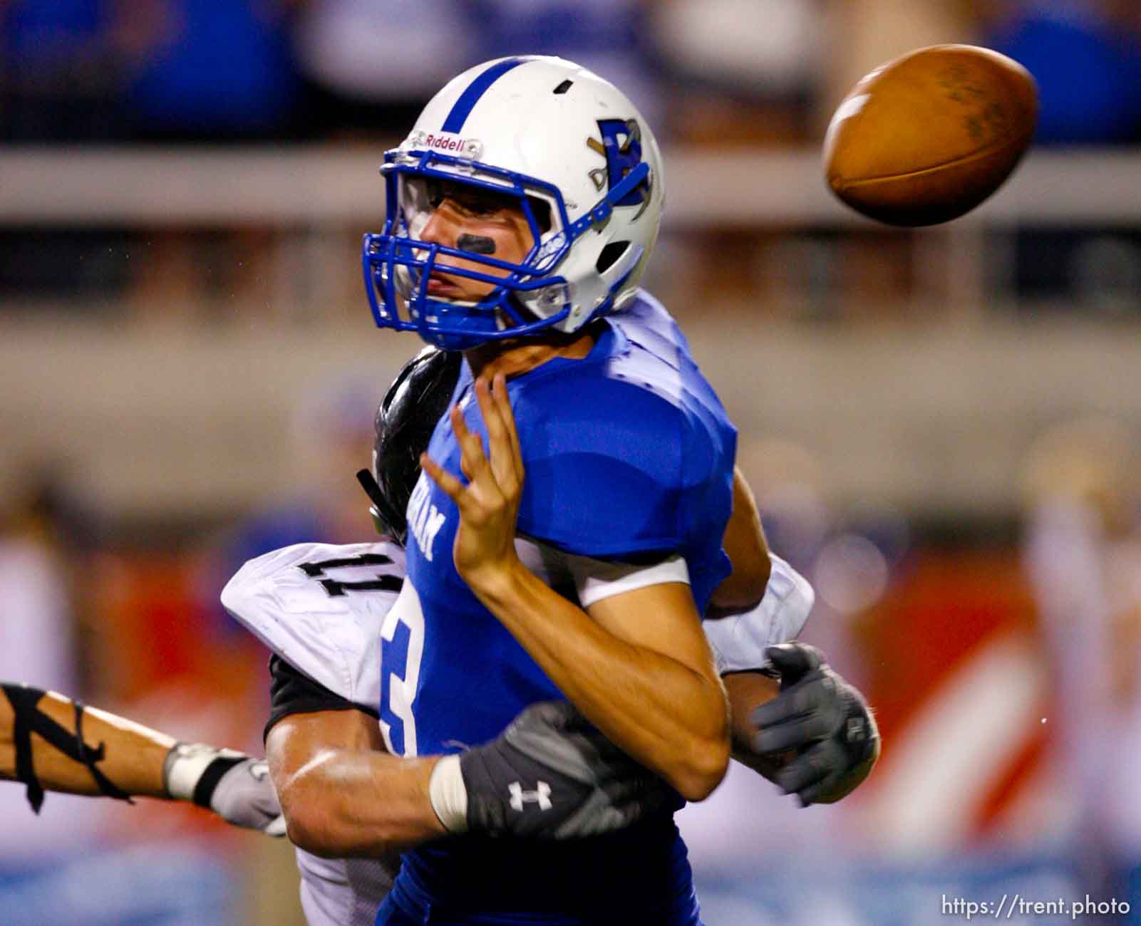 Trent Nelson  |  The Salt Lake Tribune
Alta's Ryan Jensen hits Bingham quarterback Brady Lail, causing him to fumble the ball and resulting in an Alta touchdown. Bingham vs. Alta High School football at Rice-Eccles Stadium in Salt Lake City, Utah, Saturday, August 27, 2011. Bingham wins 21-18.