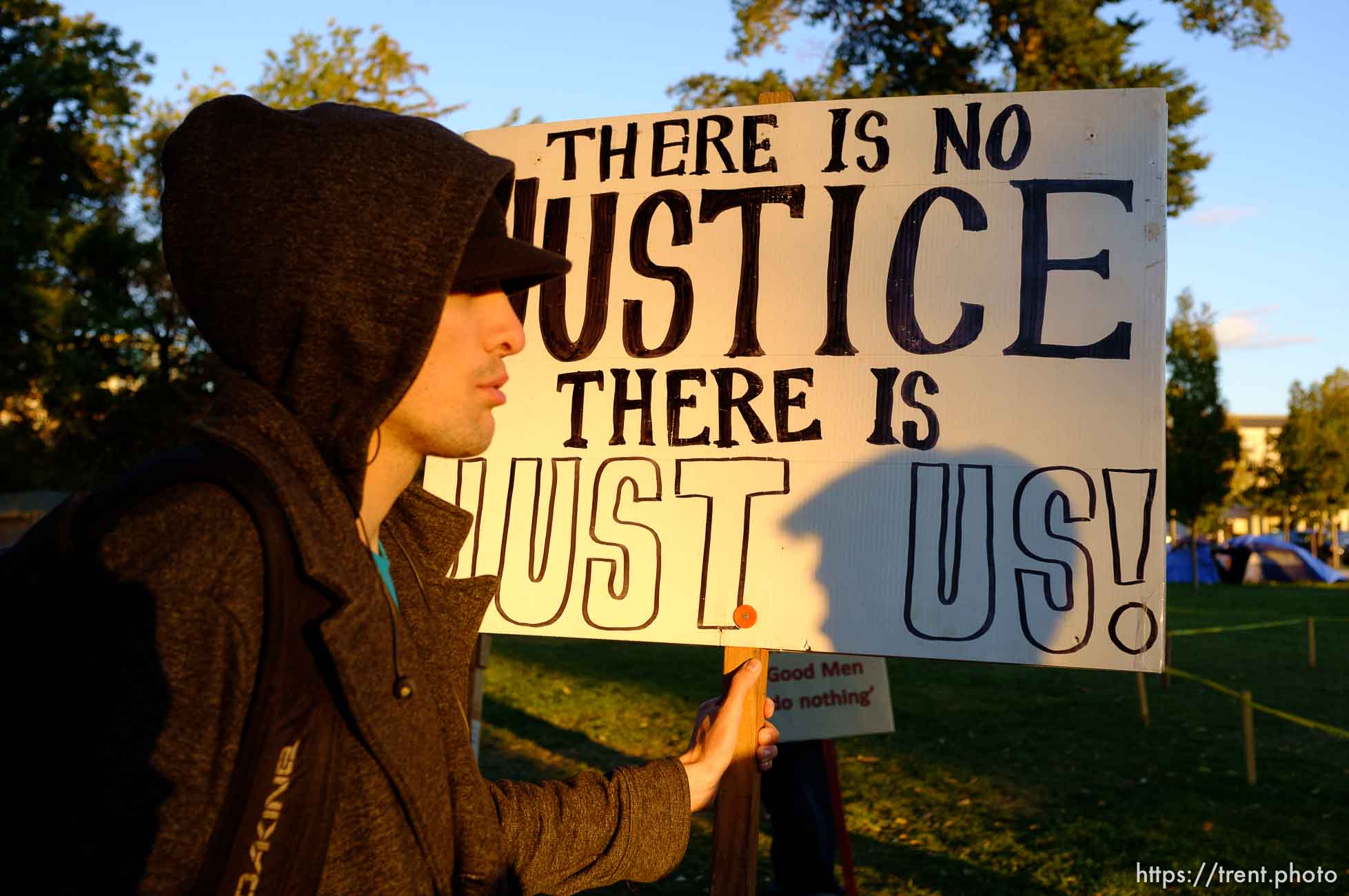 no justice just us sign, at Occupy Salt Lake, in Salt Lake City, Utah, Wednesday, October 26, 2011.