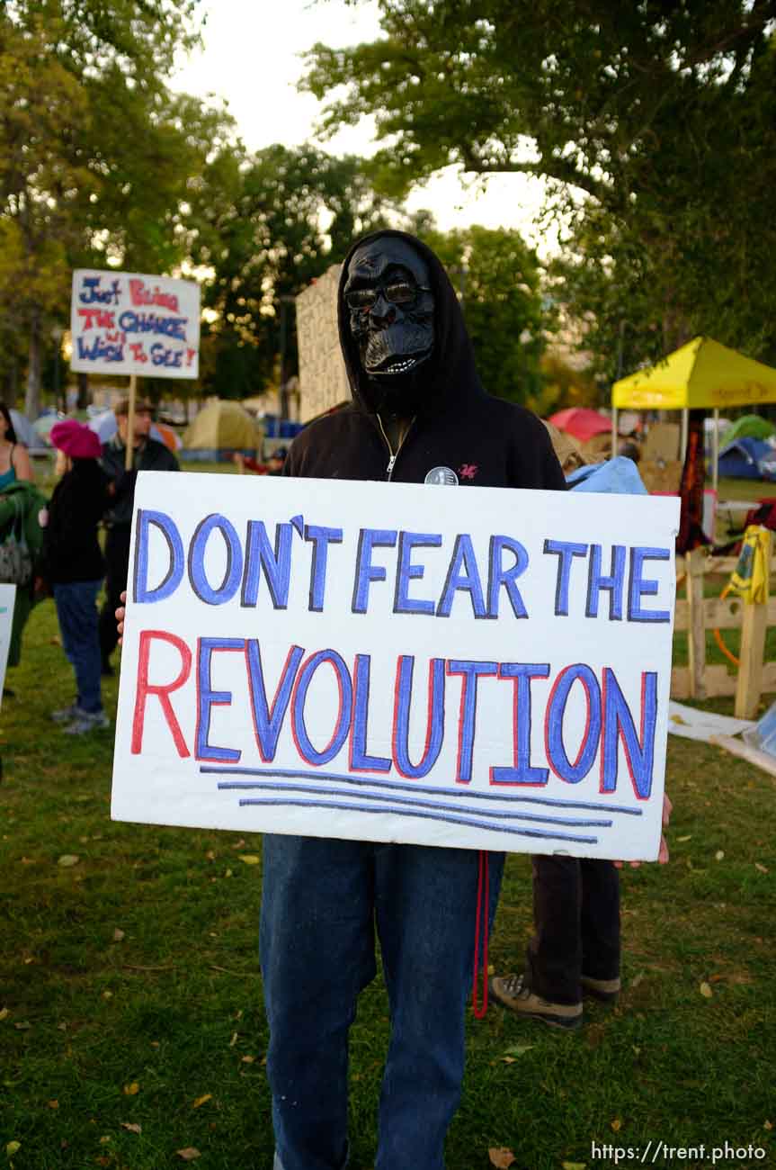 Trent Nelson  |  The Salt Lake Tribune
About two dozen protesters with Occupy Salt Lake marched from Pioneer Park to the Public Safety Building in Salt Lake City, Utah on Wednesday, October 26, 2011. They lit candles to show appreciation for the Salt Lake City police, but to protest the actions of the police in Oakland (California). man in gorilla mask