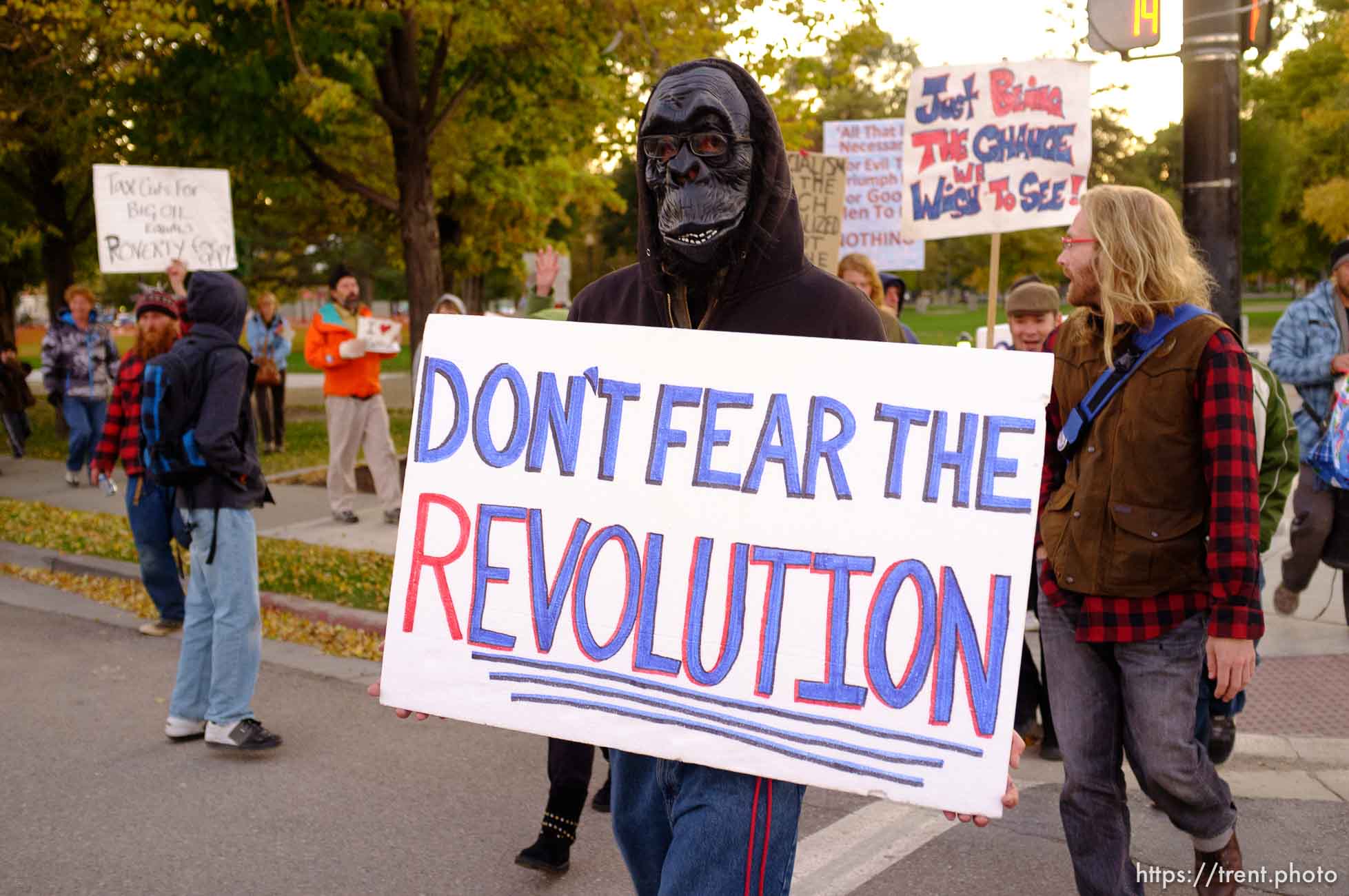 Trent Nelson  |  The Salt Lake Tribune
About two dozen protesters with Occupy Salt Lake marched from Pioneer Park to the Public Safety Building in Salt Lake City, Utah on Wednesday, October 26, 2011. They lit candles to show appreciation for the Salt Lake City police, but to protest the actions of the police in Oakland (California). man in gorilla mask