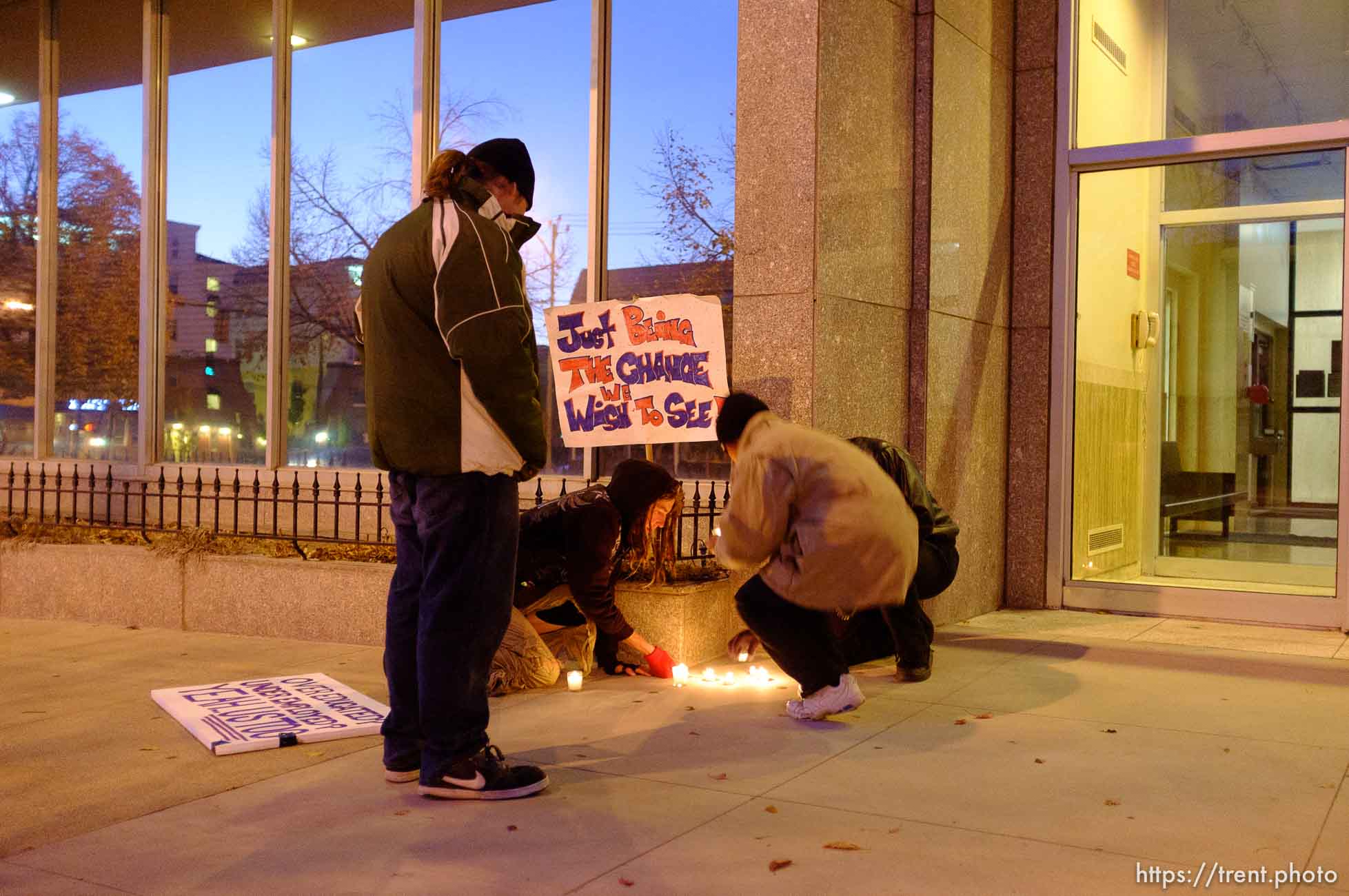 Trent Nelson  |  The Salt Lake Tribune
About two dozen protesters with Occupy Salt Lake marched from Pioneer Park to the Public Safety Building in Salt Lake City, Utah on Wednesday, October 26, 2011. They lit candles to show appreciation for the Salt Lake City police, but to protest the actions of the police in Oakland (California).