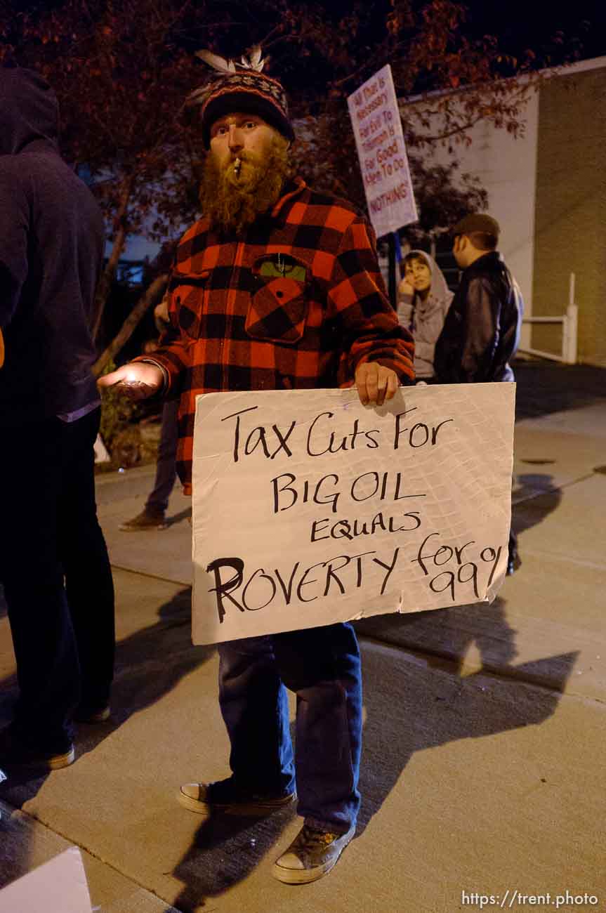 Trent Nelson  |  The Salt Lake Tribune
Braden Jordan in front of the Public Safety Building in Salt Lake City, Utah on Wednesday, October 26, 2011. About two dozen protesters with Occupy Salt Lake marched from Pioneer Park to the Public Safety Building. They lit candles to show appreciation for the Salt Lake City police, but to protest the actions of the police in Oakland (California).