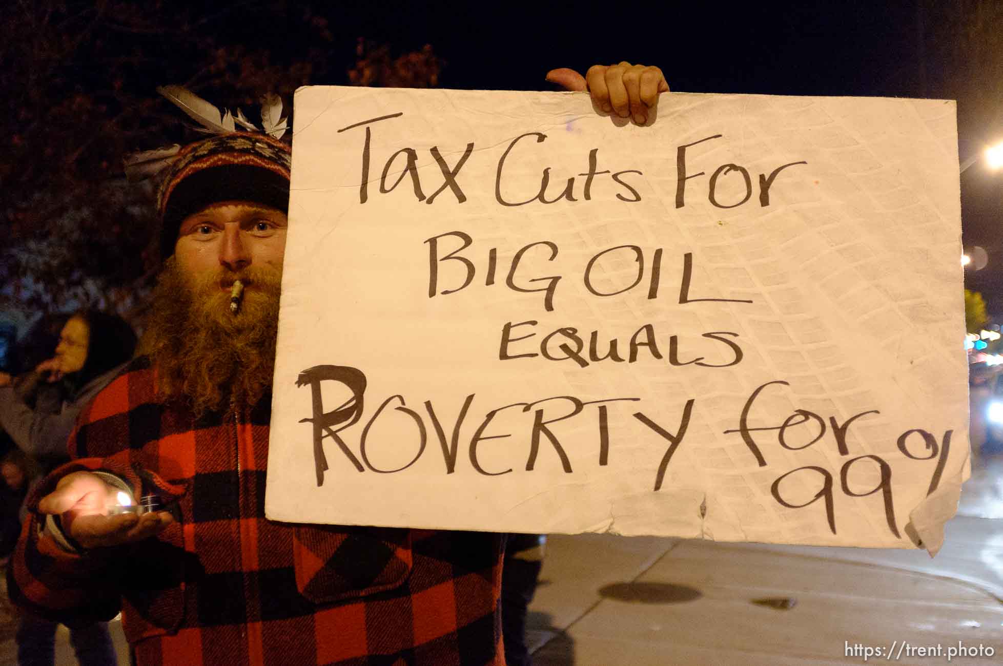 Trent Nelson  |  The Salt Lake Tribune
Braden Jordan in front of the Public Safety Building in Salt Lake City, Utah on Wednesday, October 26, 2011. About two dozen protesters with Occupy Salt Lake marched from Pioneer Park to the Public Safety Building. They lit candles to show appreciation for the Salt Lake City police, but to protest the actions of the police in Oakland (California).