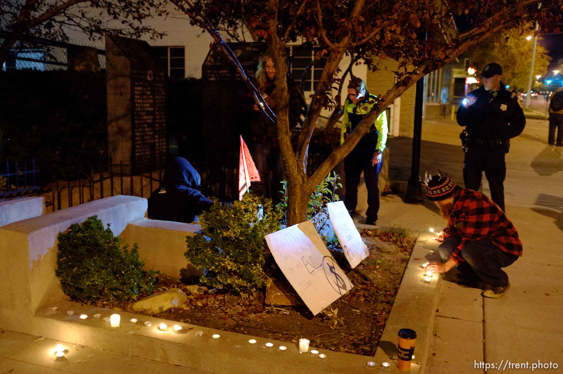 Trent Nelson  |  The Salt Lake Tribune
About two dozen protesters with Occupy Salt Lake marched from Pioneer Park to the Public Safety Building in Salt Lake City, Utah on Wednesday, October 26, 2011. They lit candles to show appreciation for the Salt Lake City police, but to protest the actions of the police in Oakland (California).