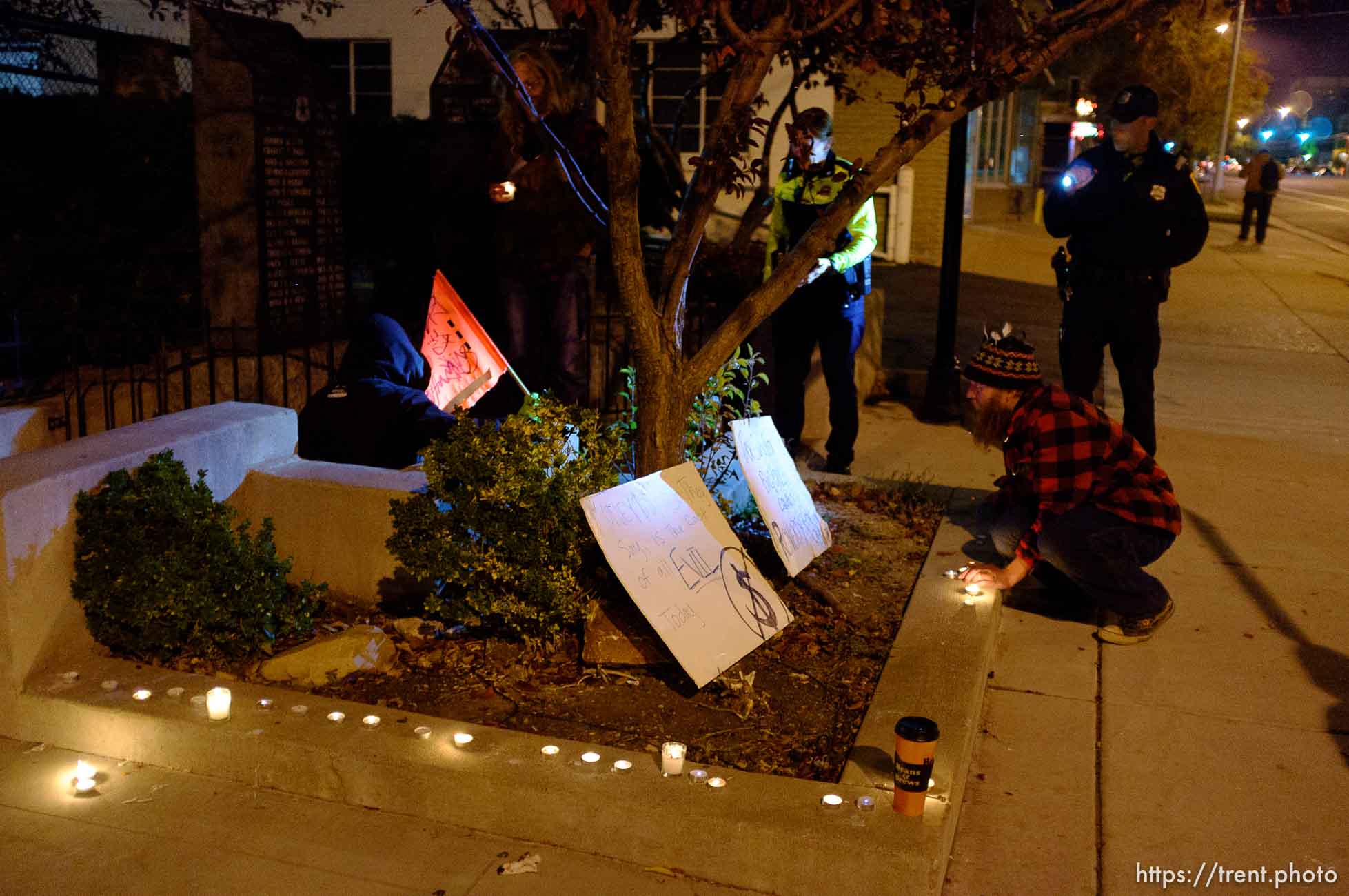 Trent Nelson  |  The Salt Lake Tribune
About two dozen protesters with Occupy Salt Lake marched from Pioneer Park to the Public Safety Building in Salt Lake City, Utah on Wednesday, October 26, 2011. They lit candles to show appreciation for the Salt Lake City police, but to protest the actions of the police in Oakland (California).