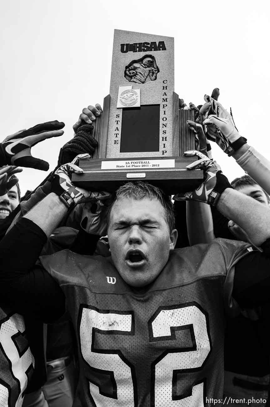 Trent Nelson  |  The Salt Lake Tribune
Manti players celebrate after Manti defeated Millard high school in the 2A State Championship football game at Pleasant Grove High School in Pleasant Grove, Utah, Saturday, November 12, 2011. #52 is Landon Carter