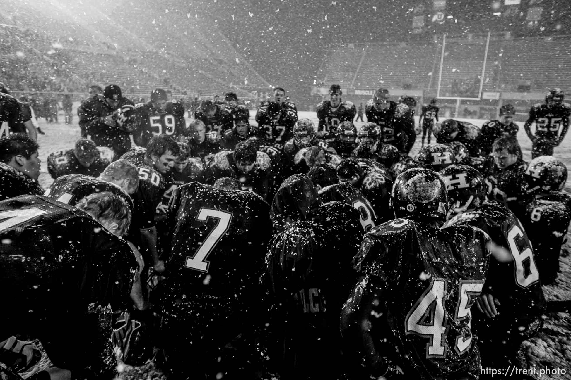 Trent Nelson  |  The Salt Lake Tribune
Hurricane players pray after they defeated Desert Hills 21-0 in the 3A State Championship high school football game at Rice-Eccles Stadium in Salt Lake City, Utah, Friday, November 18, 2011.