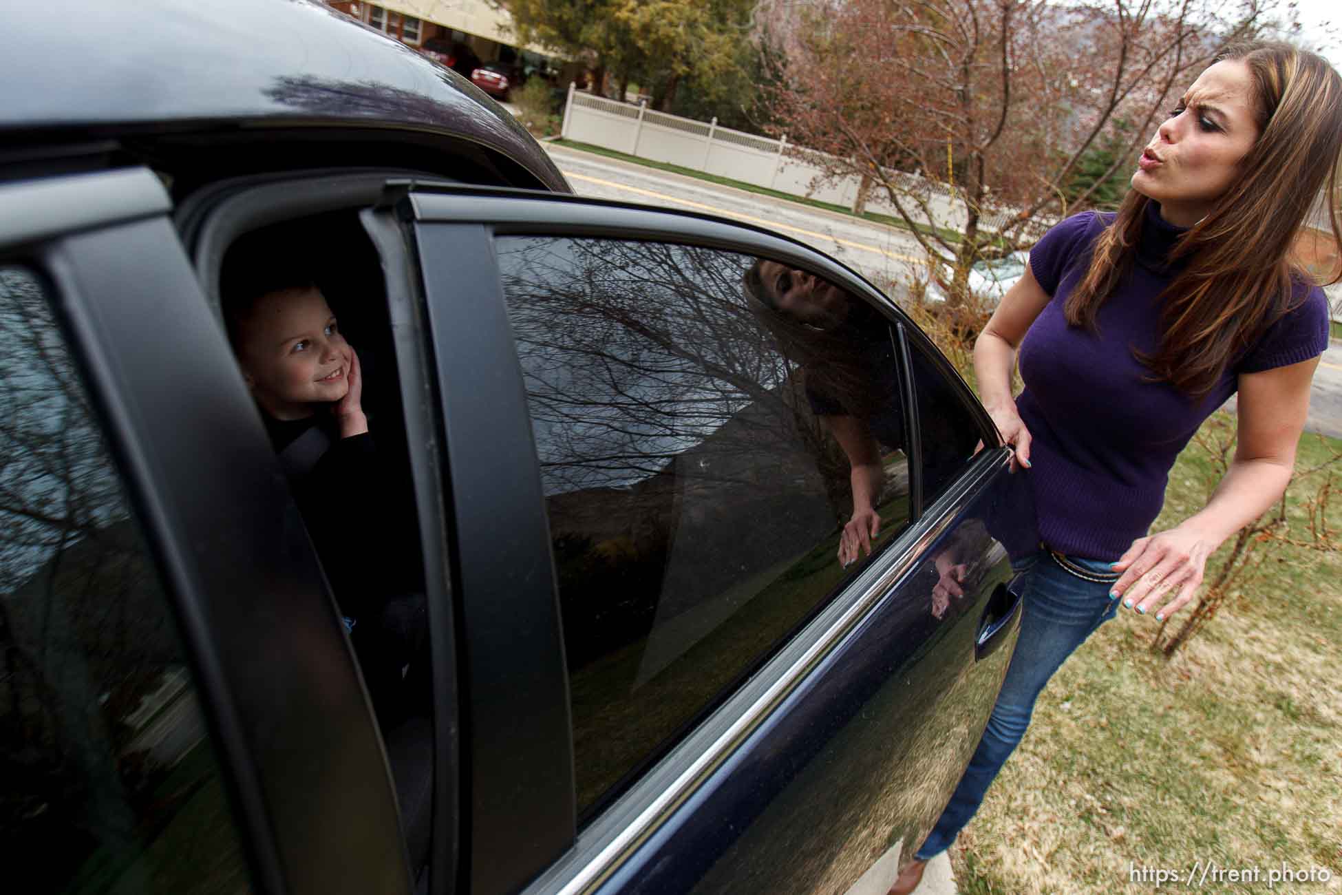 Trent Nelson  |  The Salt Lake Tribune
Jen Carver blows a kiss to her son T.J. while picking him up from day care, Thursday, March 29, 2012 in Ogden, Utah. U.S. Army veteran Jen Carver served two tours in Iraq and is now a full time college student with an on-campus job while raising her 4-year-old son.