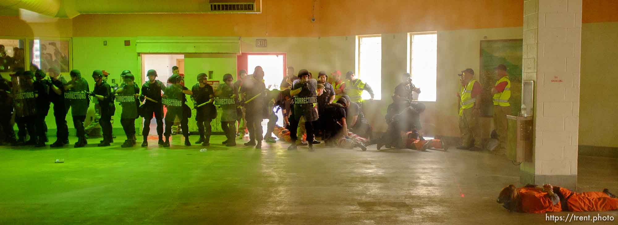 Trent Nelson  |  The Salt Lake Tribune
An emergency response team from the Michigan Department of Corrections moves in on volunteers role playing as inmates during a training scenario at the Mock Prison Riot, Monday, May 7, 2012 at the West Virginia Penitentiary in Moundsville, West Virginia.