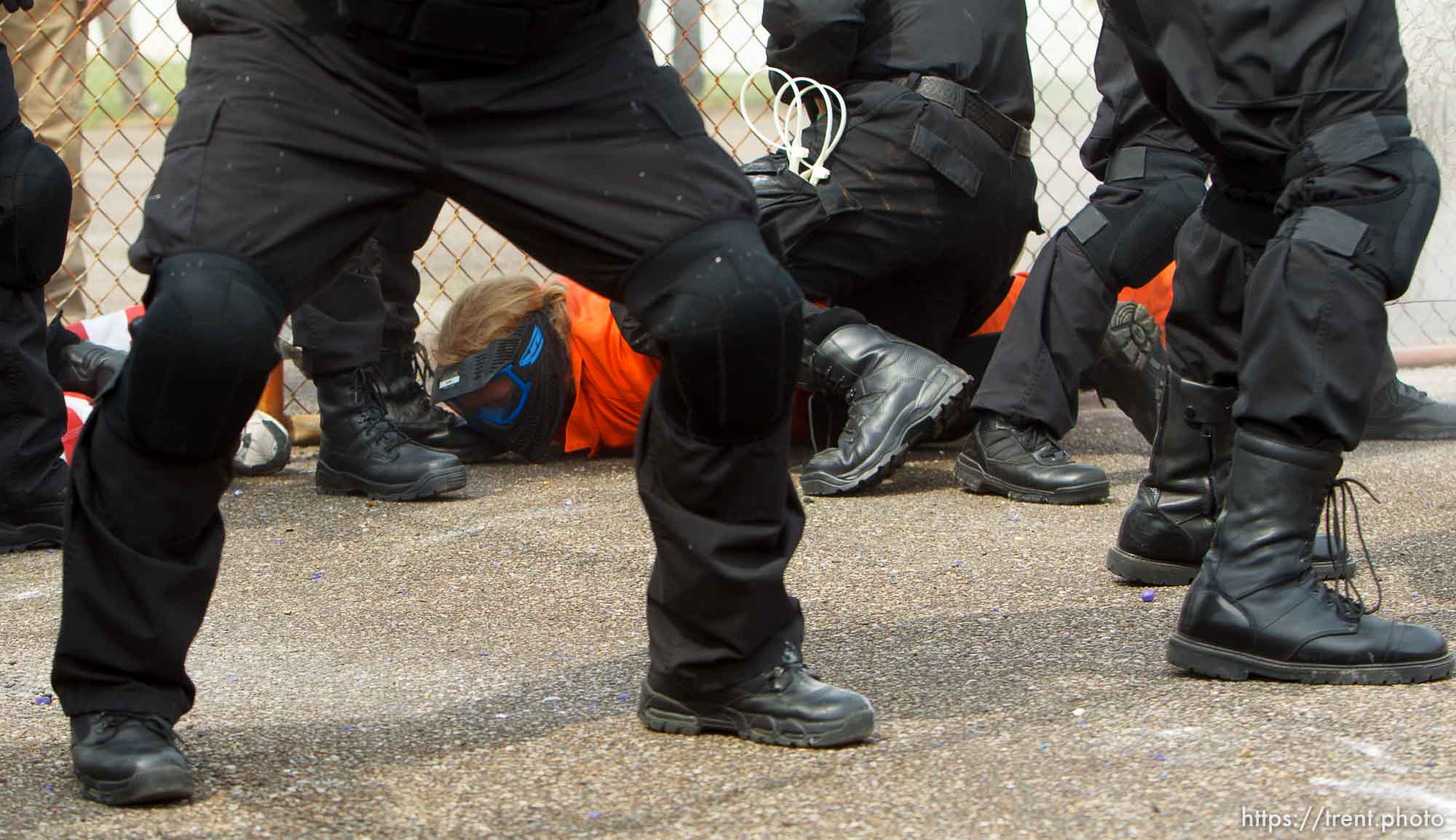 Trent Nelson  |  The Salt Lake Tribune
An emergency response team from the Chemung County (NY) Sheriff's Office subdues Weber State student Ryan Somerville, role playing as an inmate, during a training scenario at the Mock Prison Riot, Monday, May 7, 2012 at the West Virginia Penitentiary in Moundsville, West Virginia.