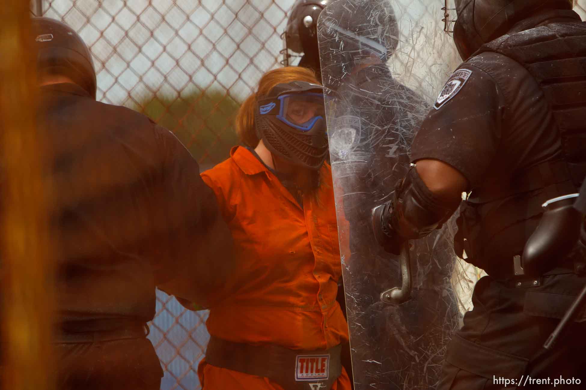 Trent Nelson  |  The Salt Lake Tribune
Weber State student Sarah Cleverley, role playing as an inmate, is subdued by an emergency response team from the Chemung County (NY) Sheriff's Office during a training scenario at the Mock Prison Riot, Monday, May 7, 2012 at the West Virginia Penitentiary in Moundsville, West Virginia.