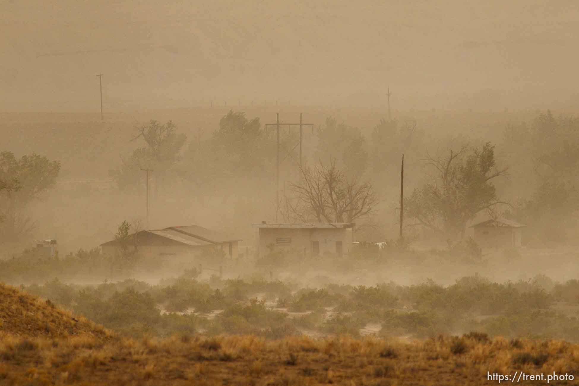 Trent Nelson  |  The Salt Lake City
A dust storm blows through the lonely town of Woodside, Utah on Wednesday, August 1, 2012.