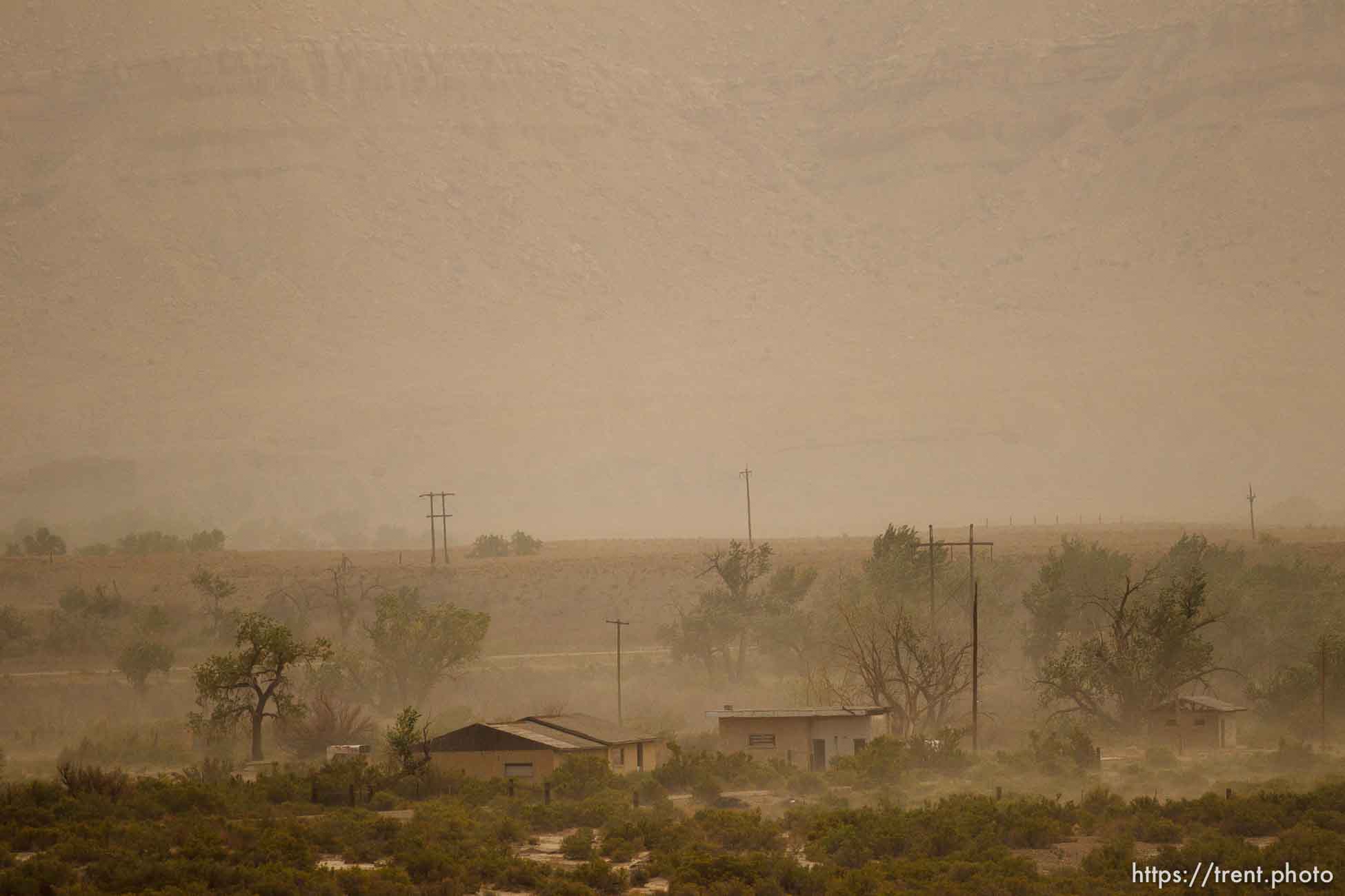 Trent Nelson  |  The Salt Lake City
A dust storm blows through the lonely town of Woodside, Utah on Wednesday, August 1, 2012.