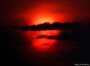 Trent Nelson  |  The Salt Lake Tribune
The setting sun burns through the haze over Salt Lake City, Utah Thursday, August 16, 2012.