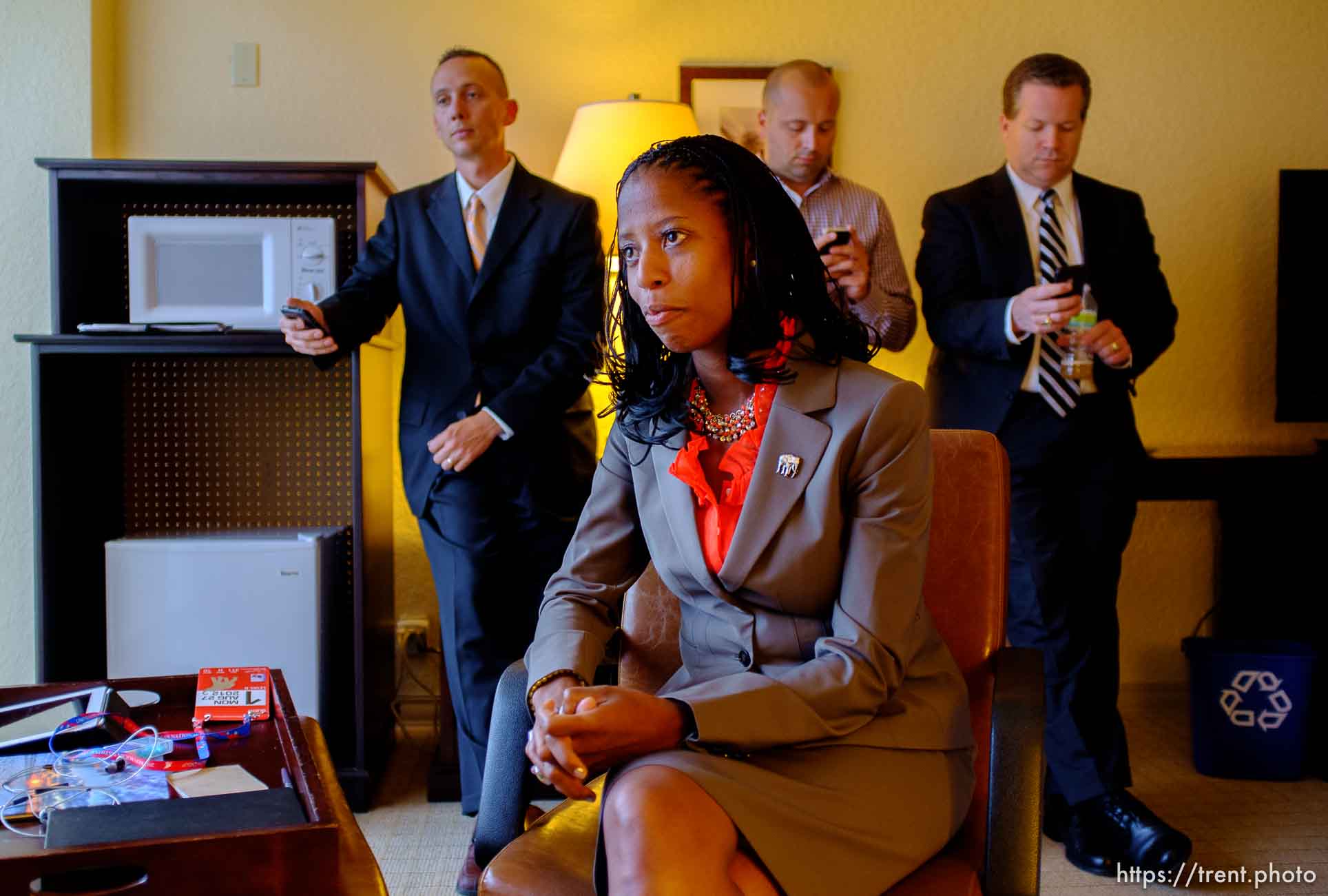 Trent Nelson  |  The Salt Lake Tribune
Utah Congressional candidate Mia Love, answers interview questions at the Sheraton Hotel in Tampa, Florida, Monday, August 27, 2012, the day before the Republican National Convention kicks off. At rear, left to right, are Love's husband Jason Love and campaign staffers Steve Hunter and Boyd Matheson.