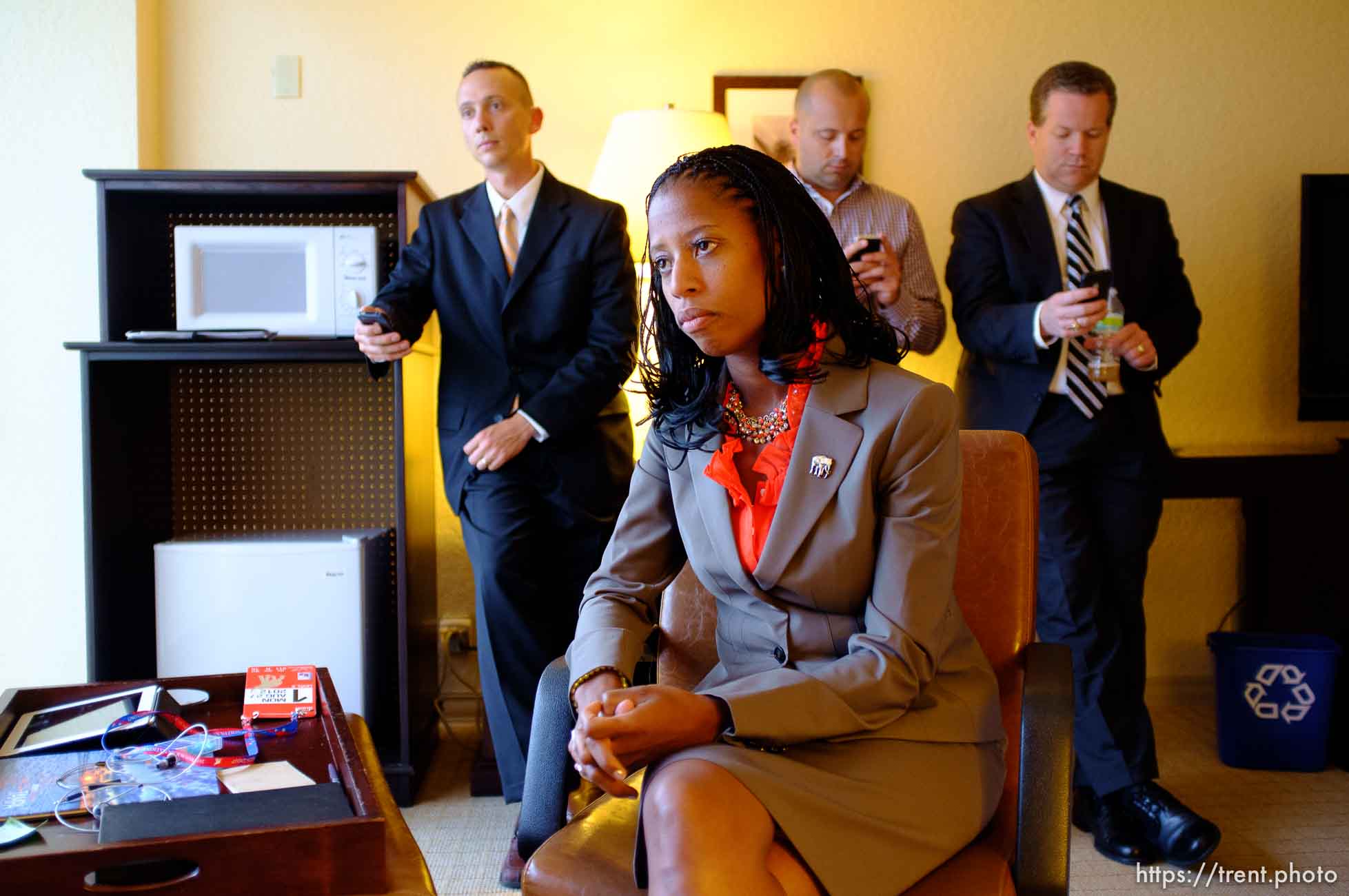 Trent Nelson  |  The Salt Lake Tribune
Utah Congressional candidate Mia Love, answers interview questions at the Sheraton Hotel in Tampa, Florida, Monday, August 27, 2012, the day before the Republican National Convention kicks off. At rear, left to right, are Love's husband Jason Love and campaign staffers Steve Hunter and Boyd Matheson.