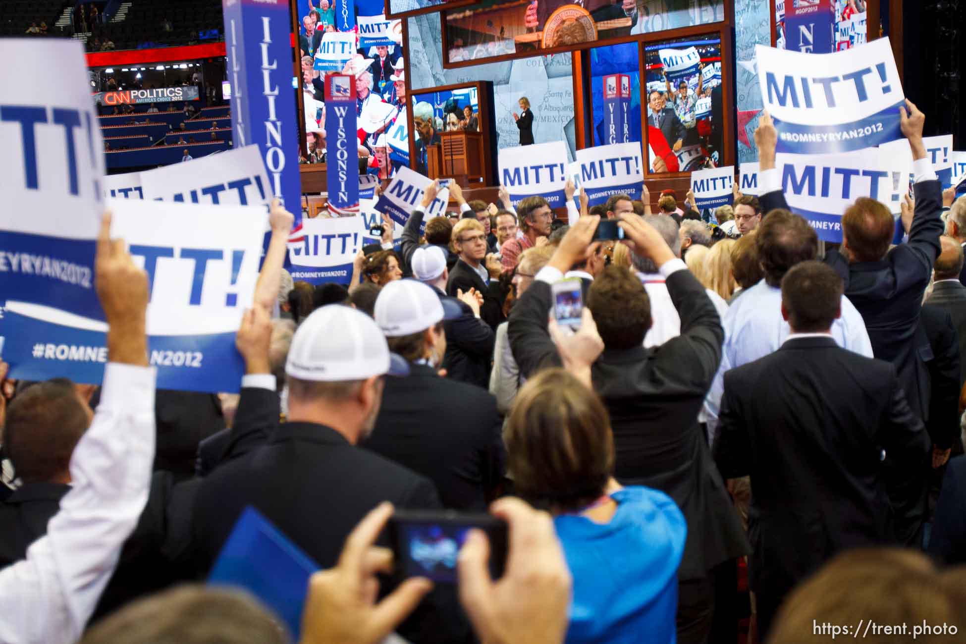 Trent Nelson  |  The Salt Lake Tribune
Delegates cheer as Mitt Romney gets enough votes for the nomination on the first day of the Republican National Convention in Tampa, Florida, Tuesday, August 28, 2012.