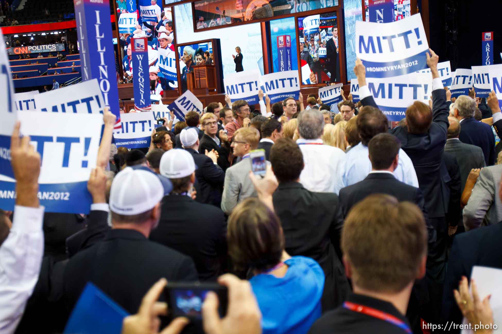 Trent Nelson  |  The Salt Lake Tribune
Delegates cheer as Mitt Romney gets enough votes for the nomination on the first day of the Republican National Convention in Tampa, Florida, Tuesday, August 28, 2012.