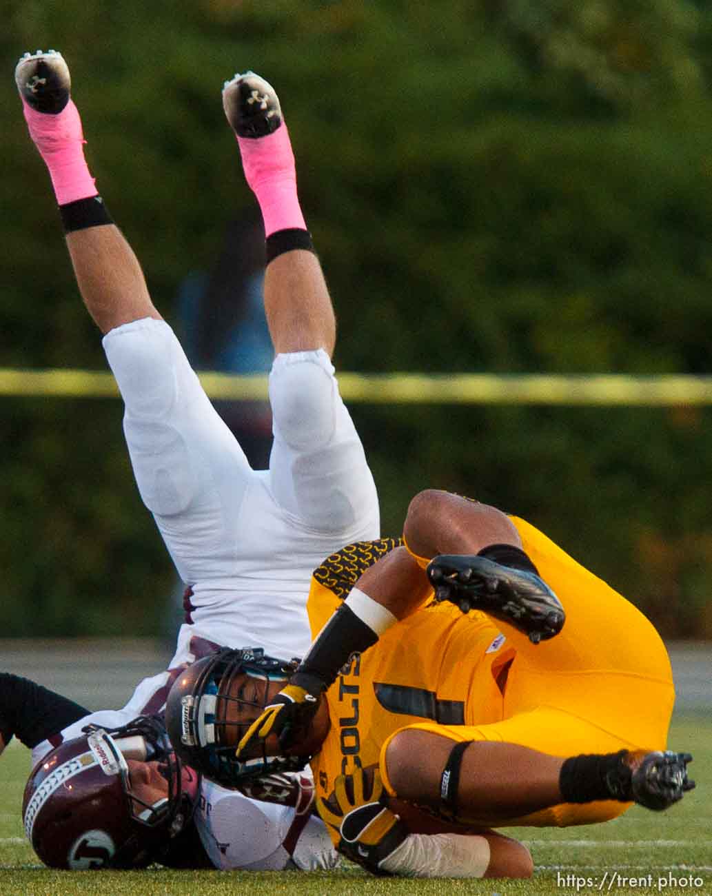 Trent Nelson  |  The Salt Lake Tribune
Jordan's Cooper Clark flips while stopping Cottonwood's Gabe Hosea as Cottonwood hosts Jordan High School football, Friday October 5, 2012.