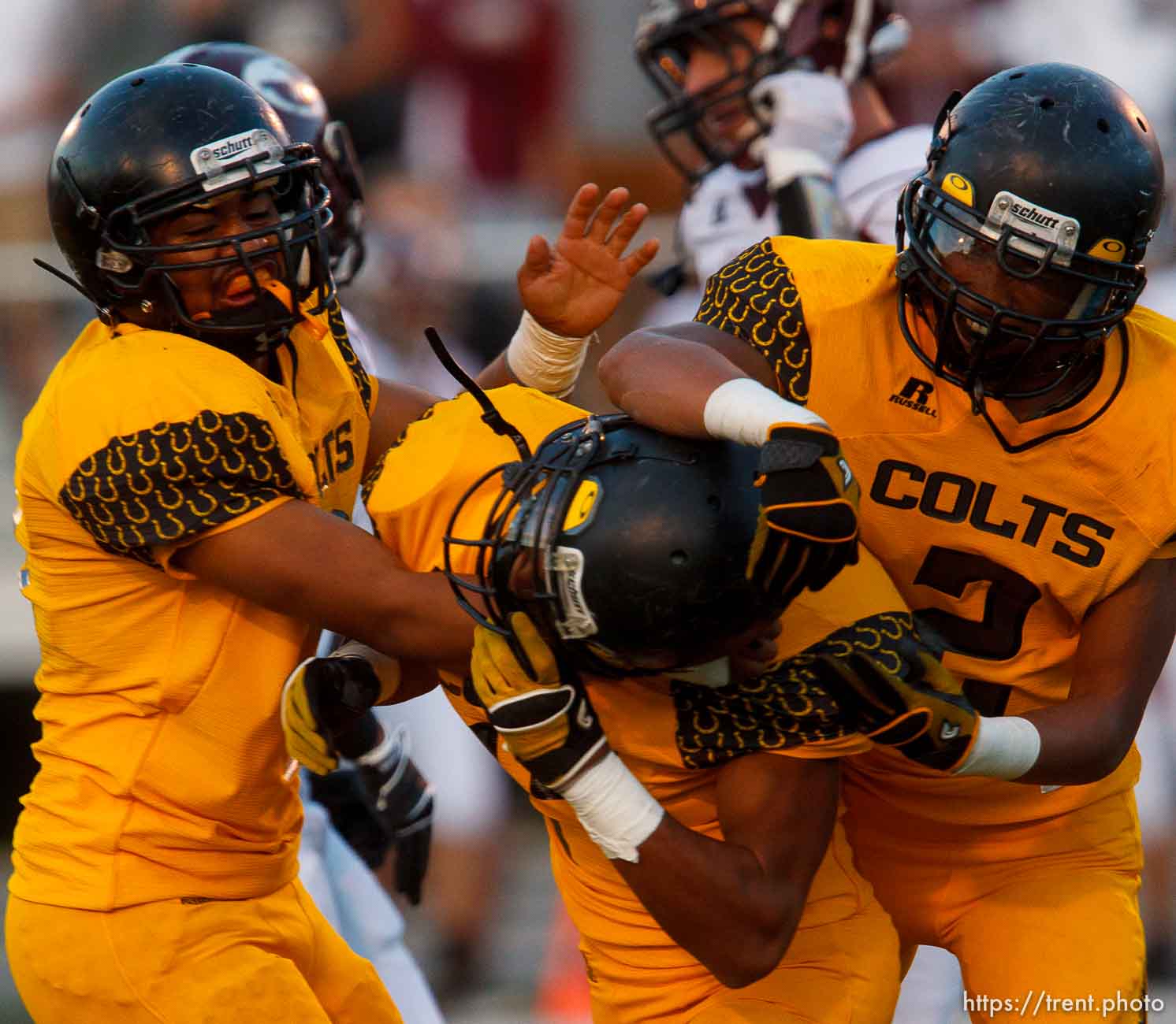 Trent Nelson  |  The Salt Lake Tribune
Cottonwood's Aleni Aiono, center, celebrates his first half interception with teammates SJ Fehoko, left, and Charles Hosea as Cottonwood hosts Jordan High School football, Friday October 5, 2012.