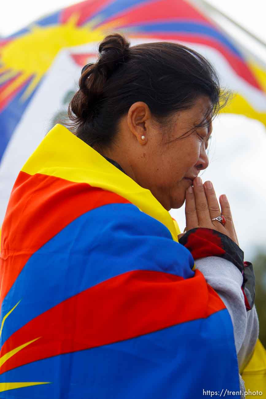 Trent Nelson  |  The Salt Lake Tribune
Tsering Chadon cries during a prayer as approximately sixty people turned out to show their support for human rights inTibet Wednesday October 24, 2012 at the state capitol in Salt Lake City, Utah. The rally was part of the Flame of Truth Relay, a worldwide torch relay to highlight dozens of Tibetan self-immolations since 2009 and promote a response from the United Nations.