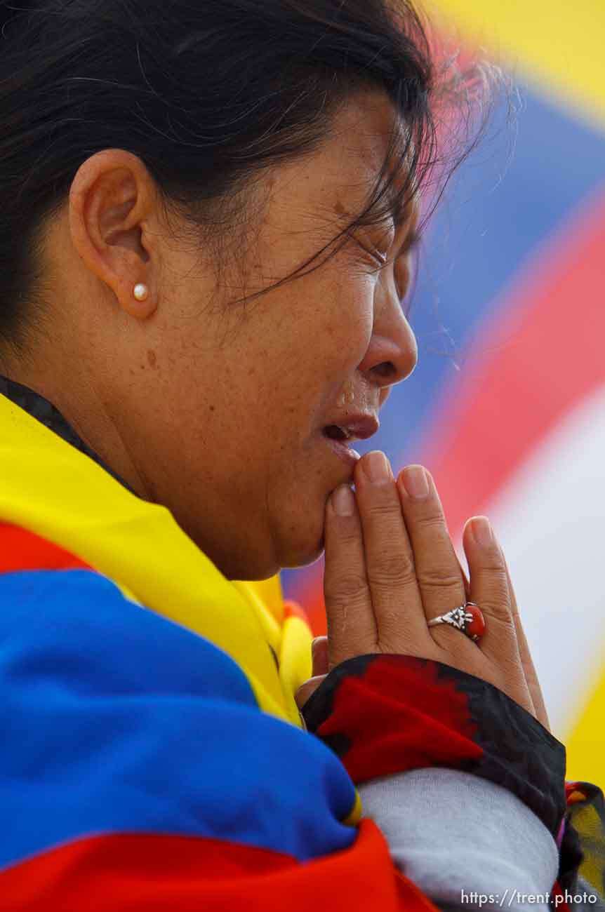 Trent Nelson  |  The Salt Lake Tribune
Tsering Chadon cries during a prayer as approximately sixty people turned out to show their support for human rights inTibet Wednesday October 24, 2012 at the state capitol in Salt Lake City, Utah. The rally was part of the Flame of Truth Relay, a worldwide torch relay to highlight dozens of Tibetan self-immolations since 2009 and promote a response from the United Nations.