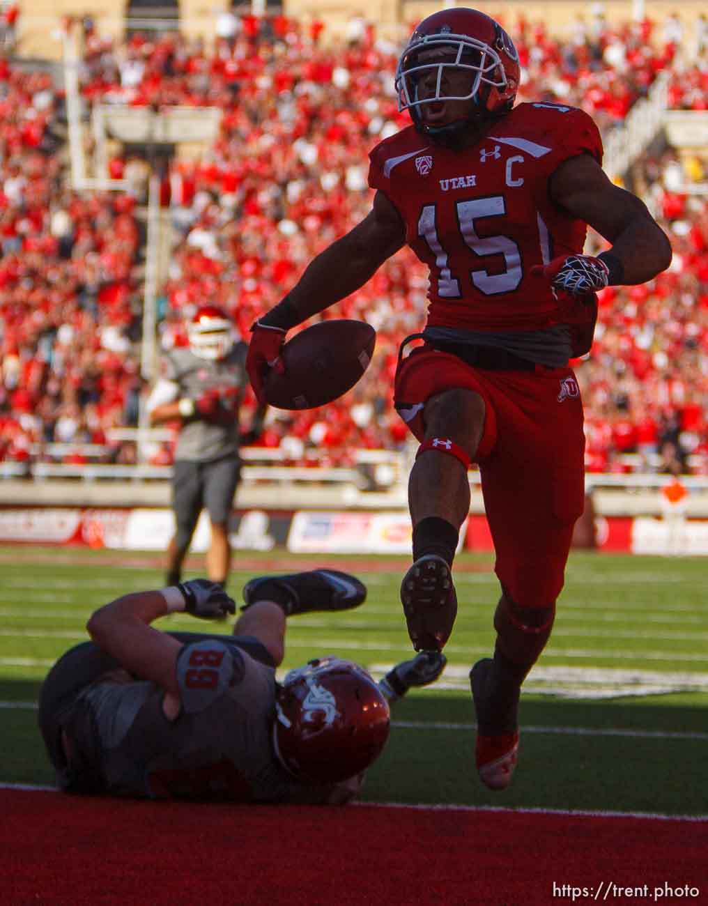 Trent Nelson  |  The Salt Lake Tribune
Utah running back John White (15) runs for a touchdown as Utah hosts Washington State, college football at Rice-Eccles Stadium Saturday November 3, 2012 in Salt Lake City.