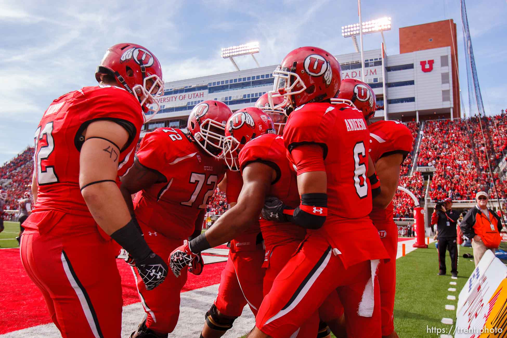 Trent Nelson  |  The Salt Lake Tribune
Utah running back John White (15) celebrates a touchdown with teammates, butting heads with Utah offensive linesman Miles Mason (72), as Utah hosts Washington State, college football at Rice-Eccles Stadium Saturday November 3, 2012 in Salt Lake City.