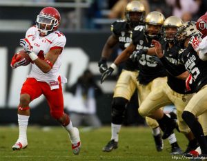 Trent Nelson  |  The Salt Lake Tribune
Utah Utes wide receiver Reggie Dunn (14) returns a kick for a touchdown in the fourth quarter as the Colorado Buffaloes host the University of Utah Utes, college football Friday November 23, 2012 in Boulder.