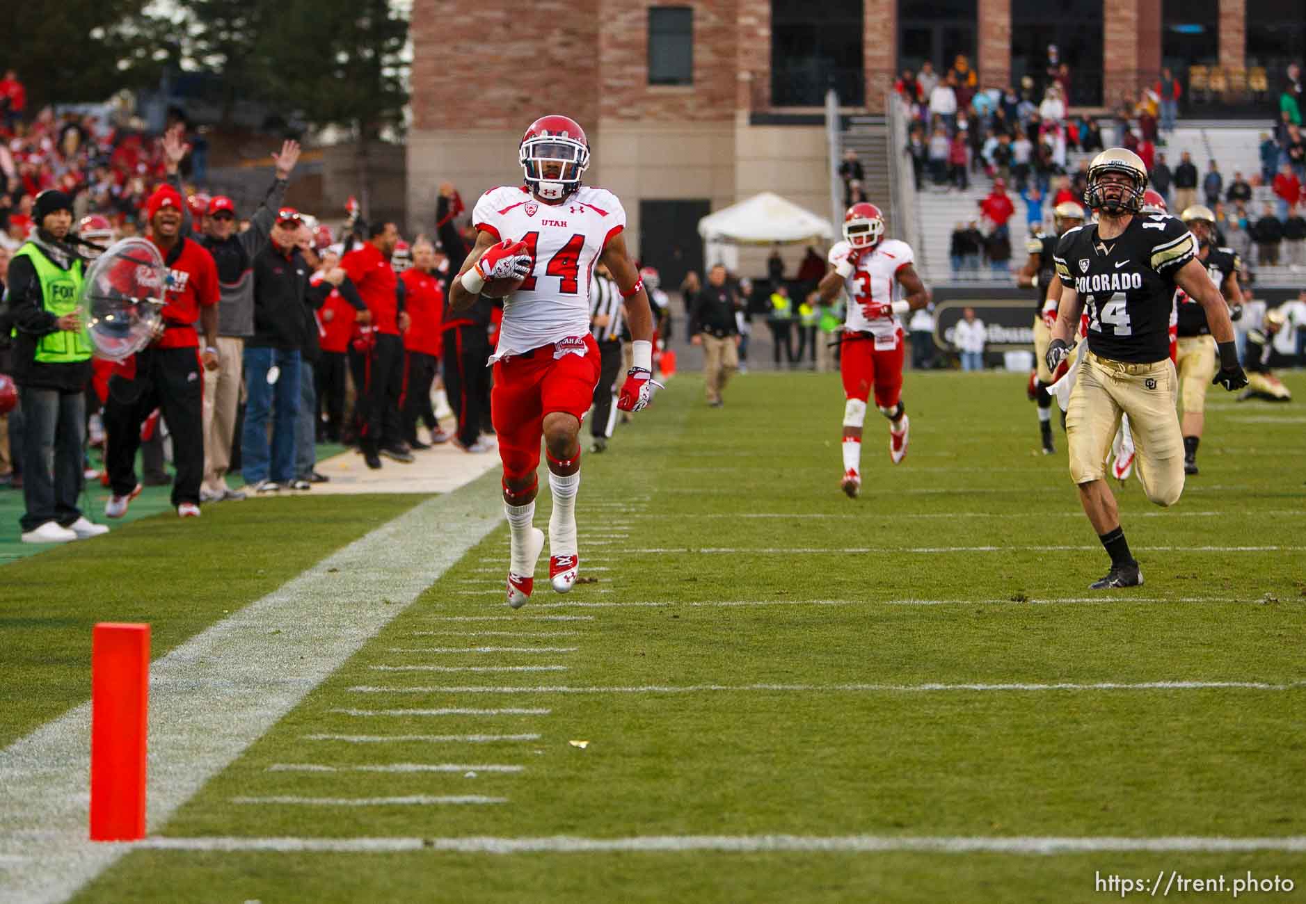 Trent Nelson  |  The Salt Lake Tribune
Utah Utes wide receiver Reggie Dunn (14) returns a kick for a touchdown in the fourth quarter as the Colorado Buffaloes host the University of Utah Utes, college football Friday November 23, 2012 in Boulder.